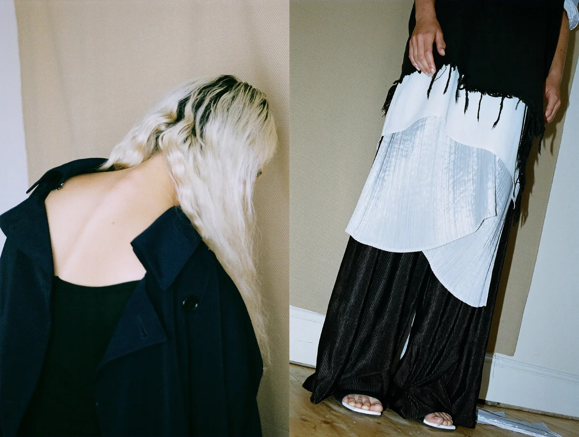 navy trench coat ANTE LONDON jumpsuit BEYOND RETRO . shredded top FRAV silk white top STYLIST'S OWN grey dress ISSEY MIYAKE black trousers AMERICAN APPAREL shoes STYLIST'S OWN