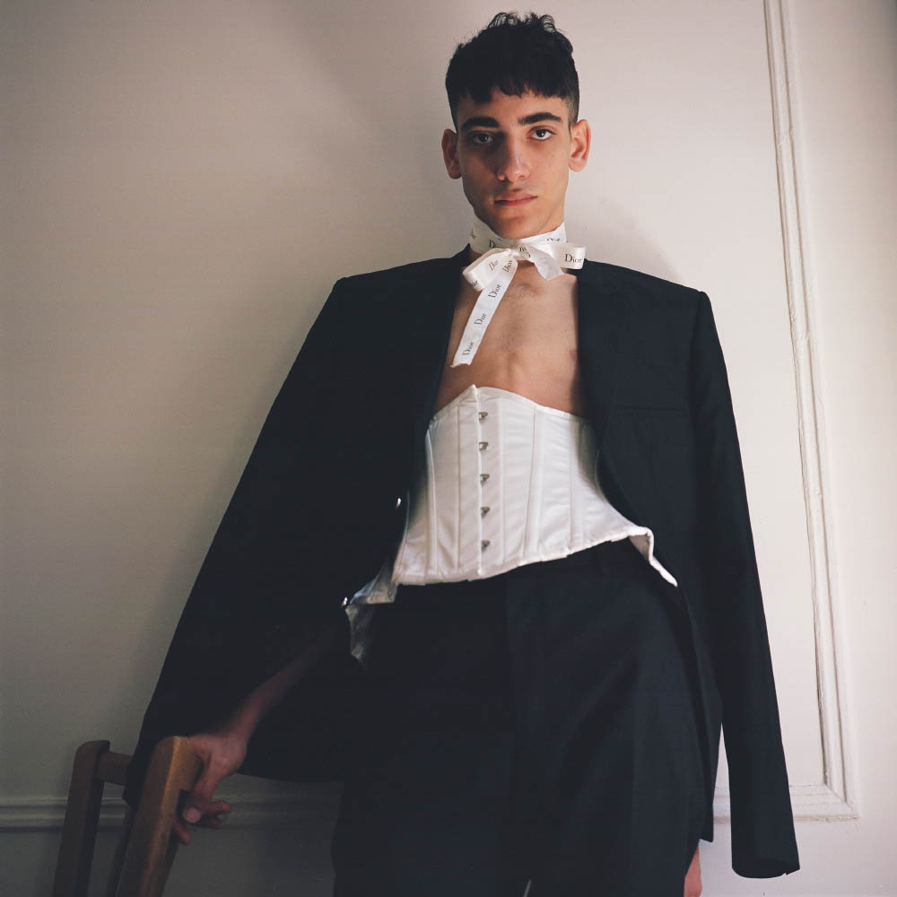 suit jacket and pants CALVIN KLEIN corset and bow STYLIST'S OWN