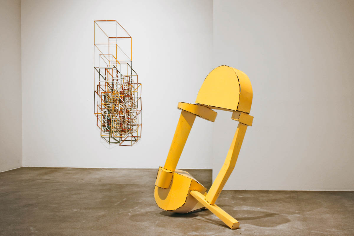 Structured Space, 2011, Salvage Steel and Rivets, 172.72 x 76.2 x 5.08 cm. Fidelity Investments, Boston, Massachusetts. Bounce Back 2011, Valley Roll Steel, Rivets, Enamel Paint, 152.4 x 114.3 x 88.9 cm. Collection of Ted Larsen