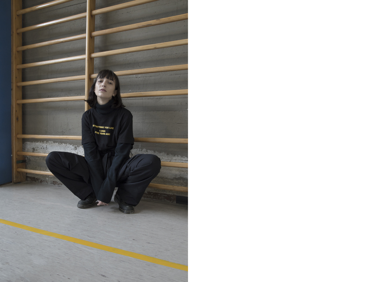 Clara wears t-shirt OFF-WHITE pants NICOLA INDELICATO boots DR.MARTENS