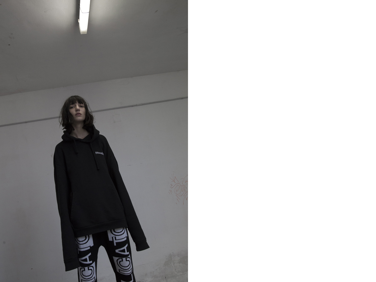 Clara wears hoodie VETEMENTS pants NICOLA INDELICATO