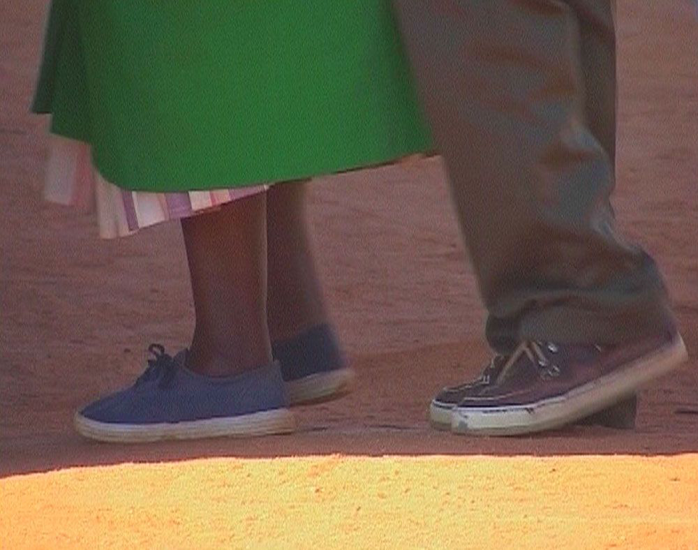 Video stills from “Where do I begin,” 2001.