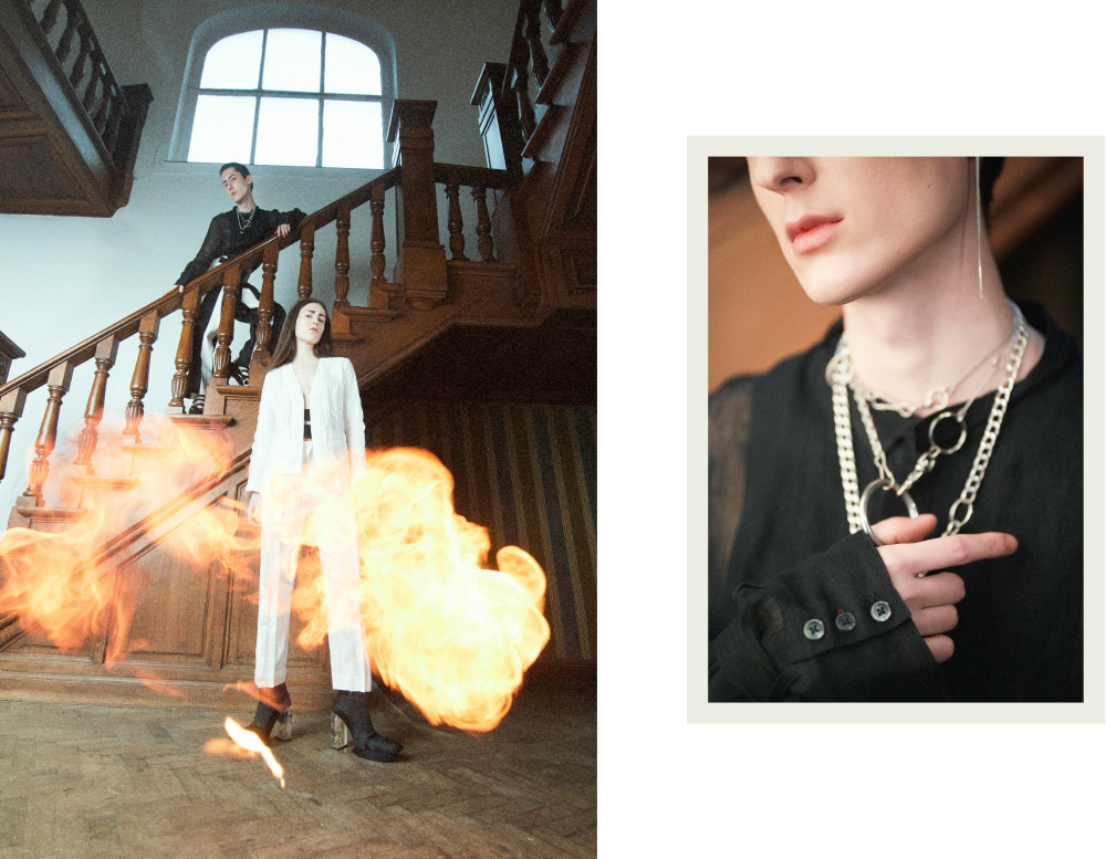 Christopher wears jacket and pants GIOIA SEGHERS shoes ADULT . Anne Marie wears shirt and pants ANN DEMEULEMEESTER shoes DINKY AGORA GALLERY . Christopher wears necklaces THE PONY CLUB jacket GIOIA SEGHERS