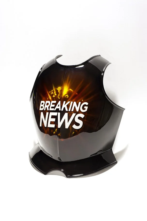 Breaking News, 2017. Airbrush painting on metal breastplate. 47 × 40 × 17 cm.