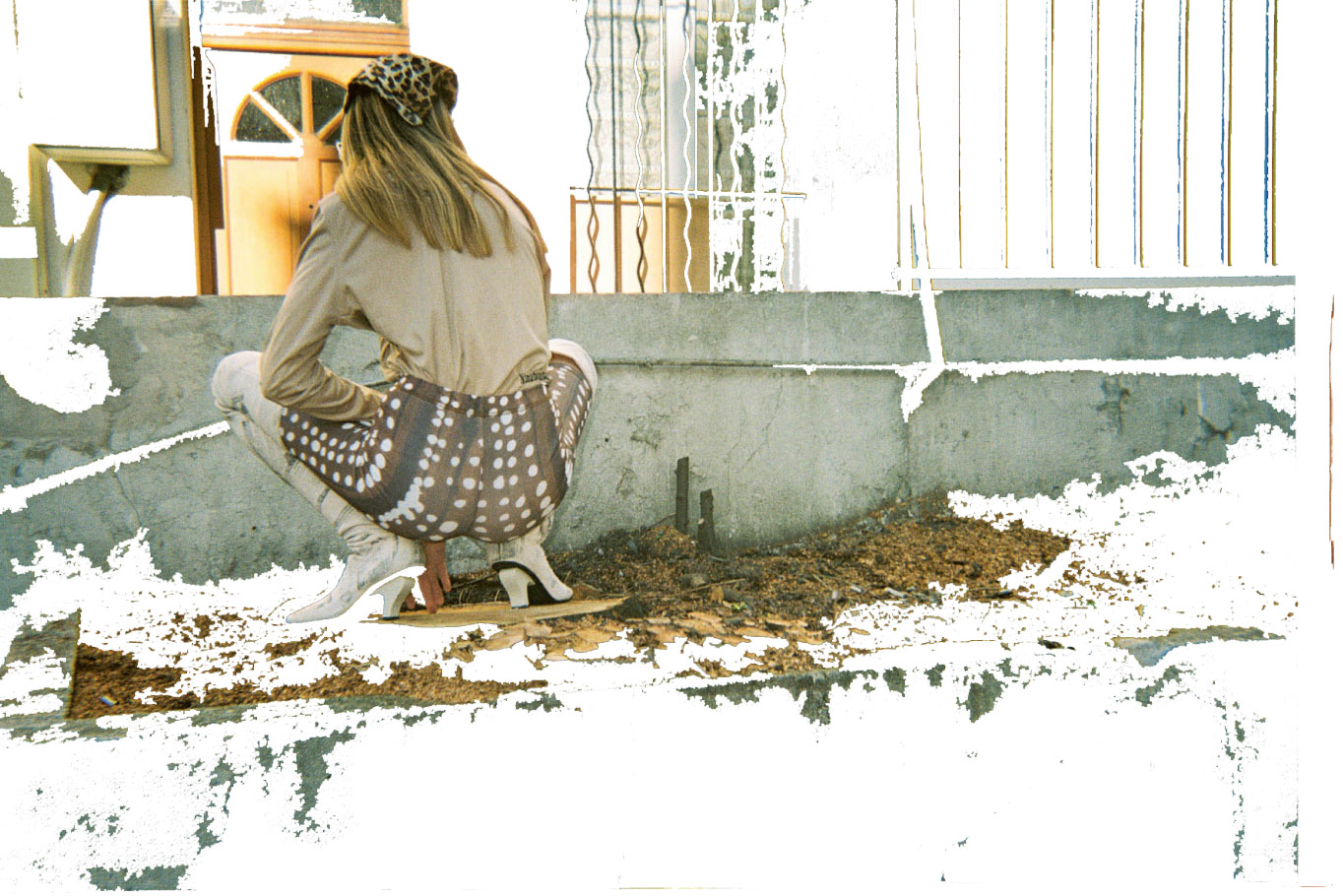 top NINAMOUNAH short pants FLEAMADONNA boots NEITH NYER scarf STYLIST’S OWN earring FLORENCE TETIER
