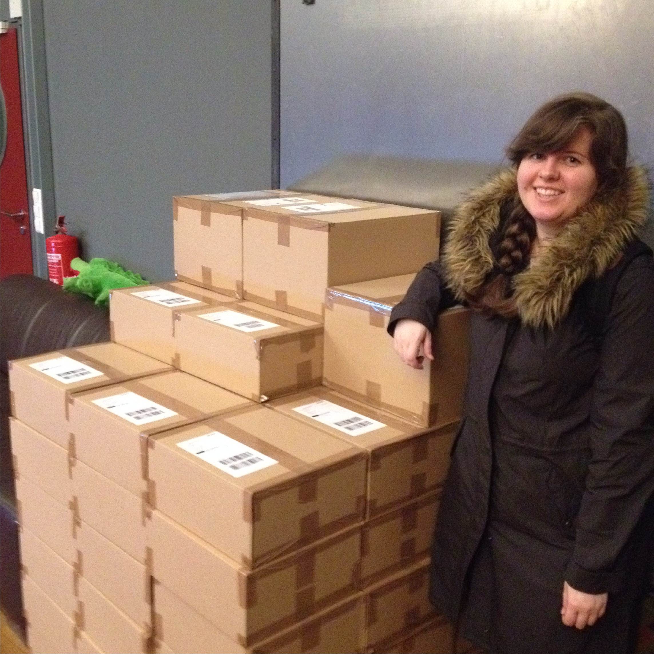 Kits awaiting pick-up for delivery! (Anne posing for height reference)