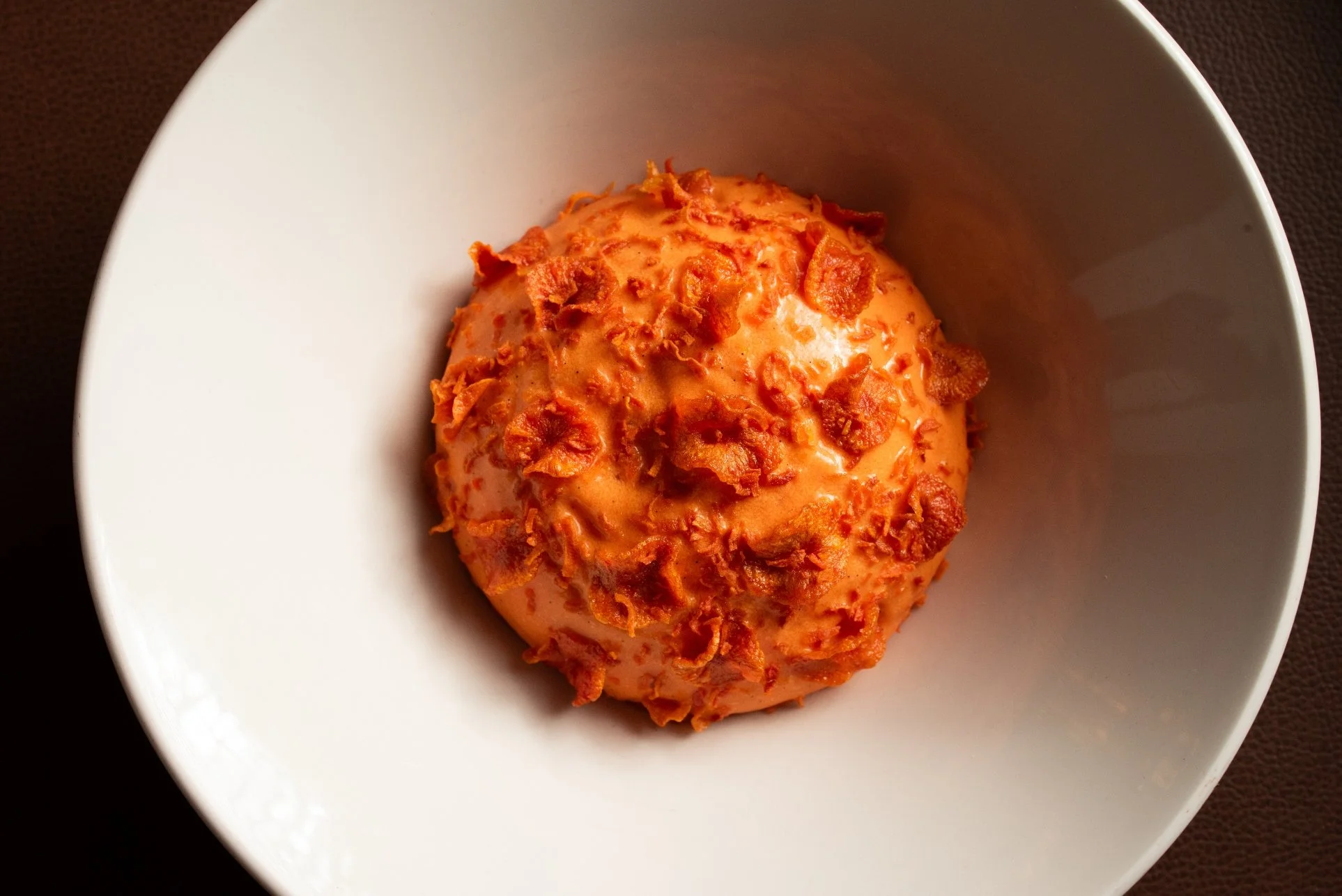 A carrot cake dessert, available at iconic, Michelin-Starred Sepia Chicago in the West Loop.
