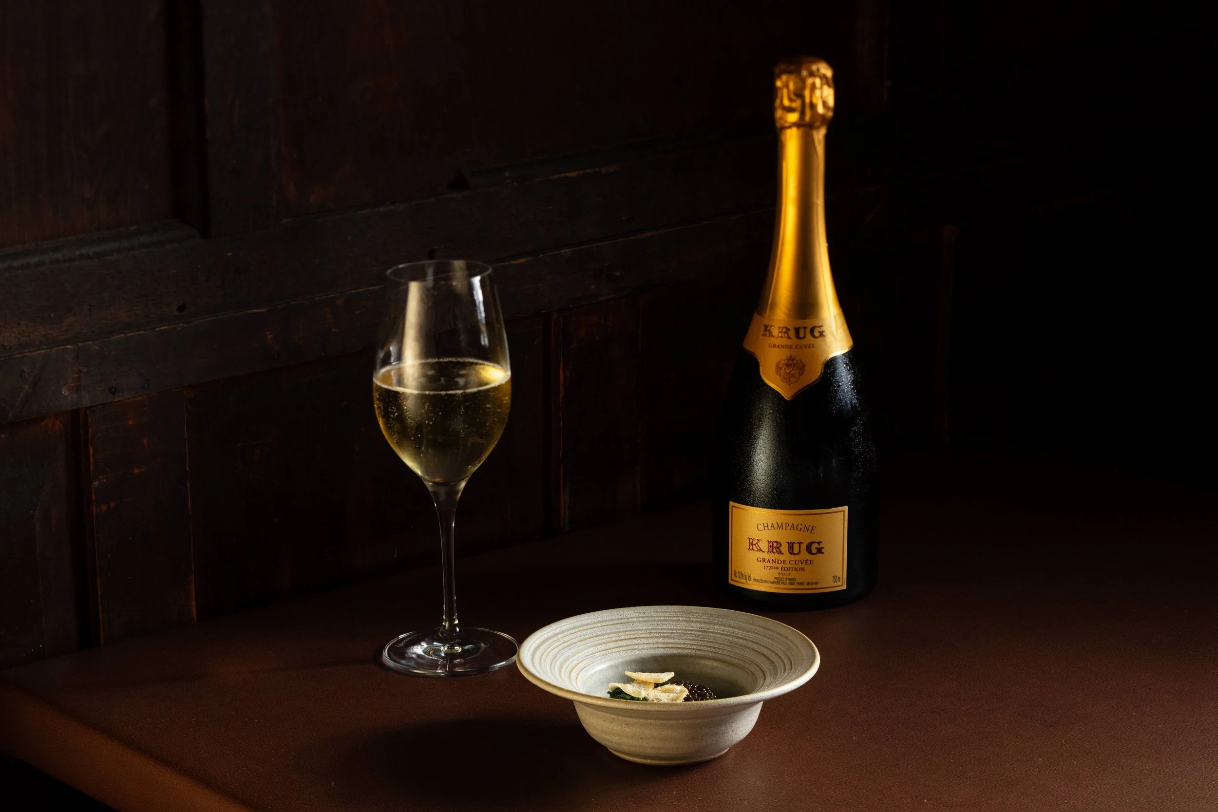 Limited time-offer, a pairing of Krug Champagne alongside tasting menu Ostera caviar course, at Sepia in Chicago's West Loop.