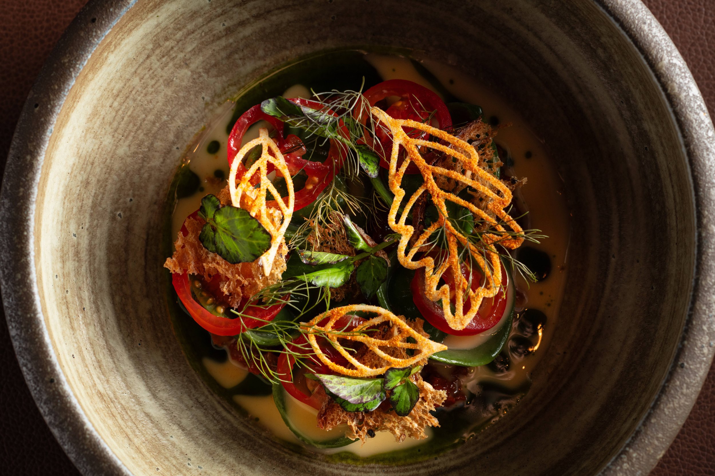 Ricotta capatelli, garnished with tuilles, peppers, and dill. Available at Sepia in Chicago's West Loop. 
