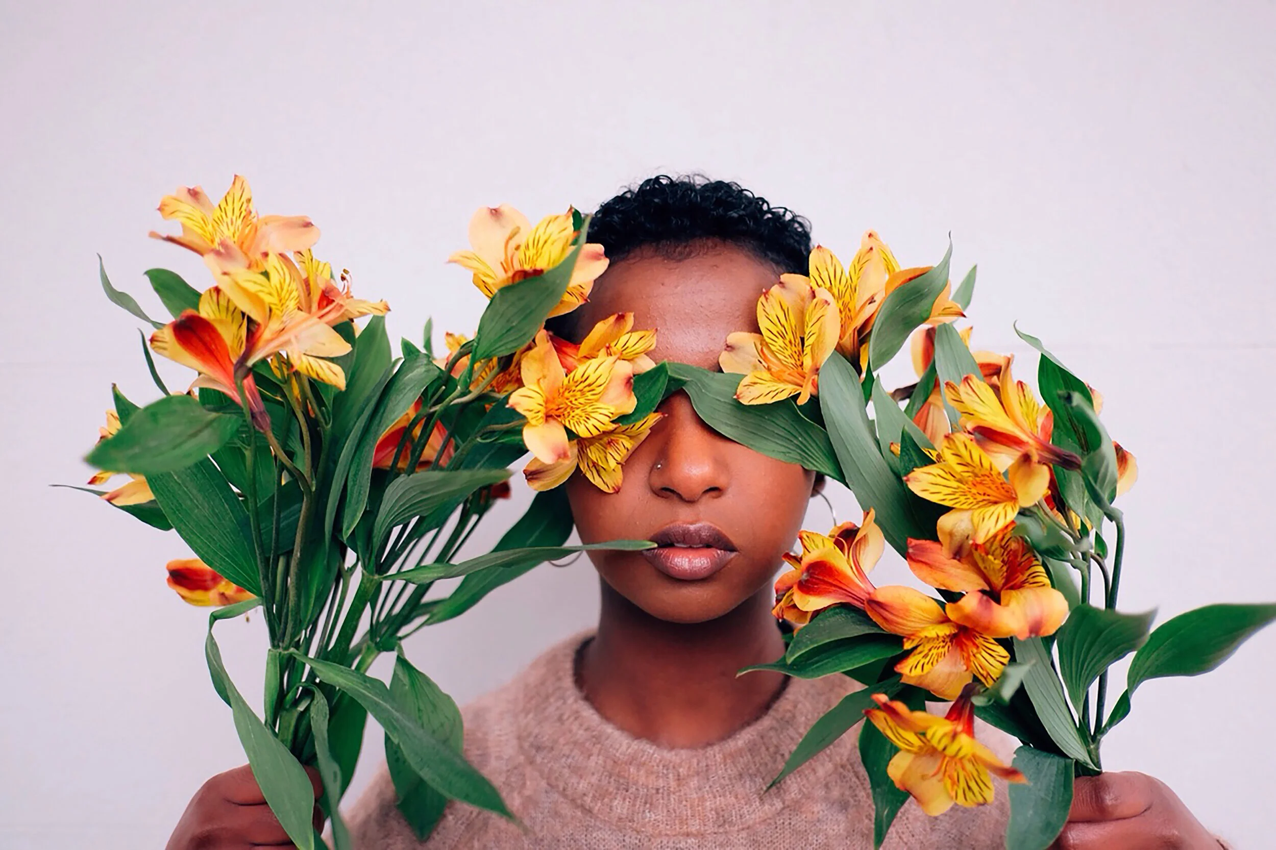 iman and yellow flowers.jpg