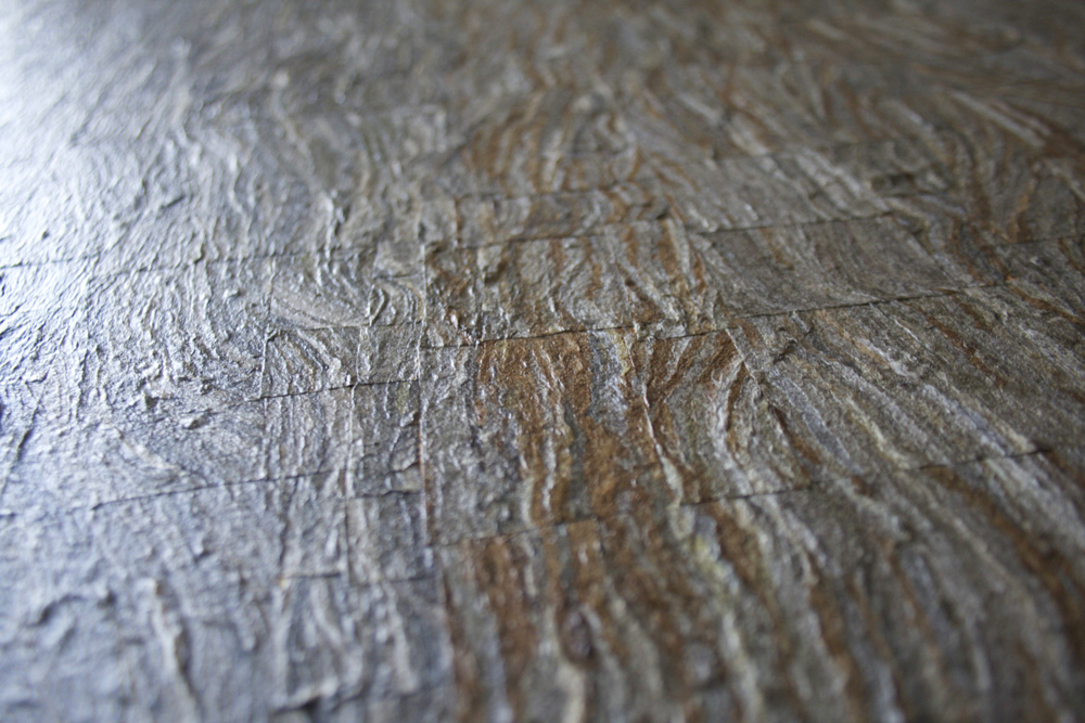 Detailed patchwork of a Textured 'Painting' nest piece.