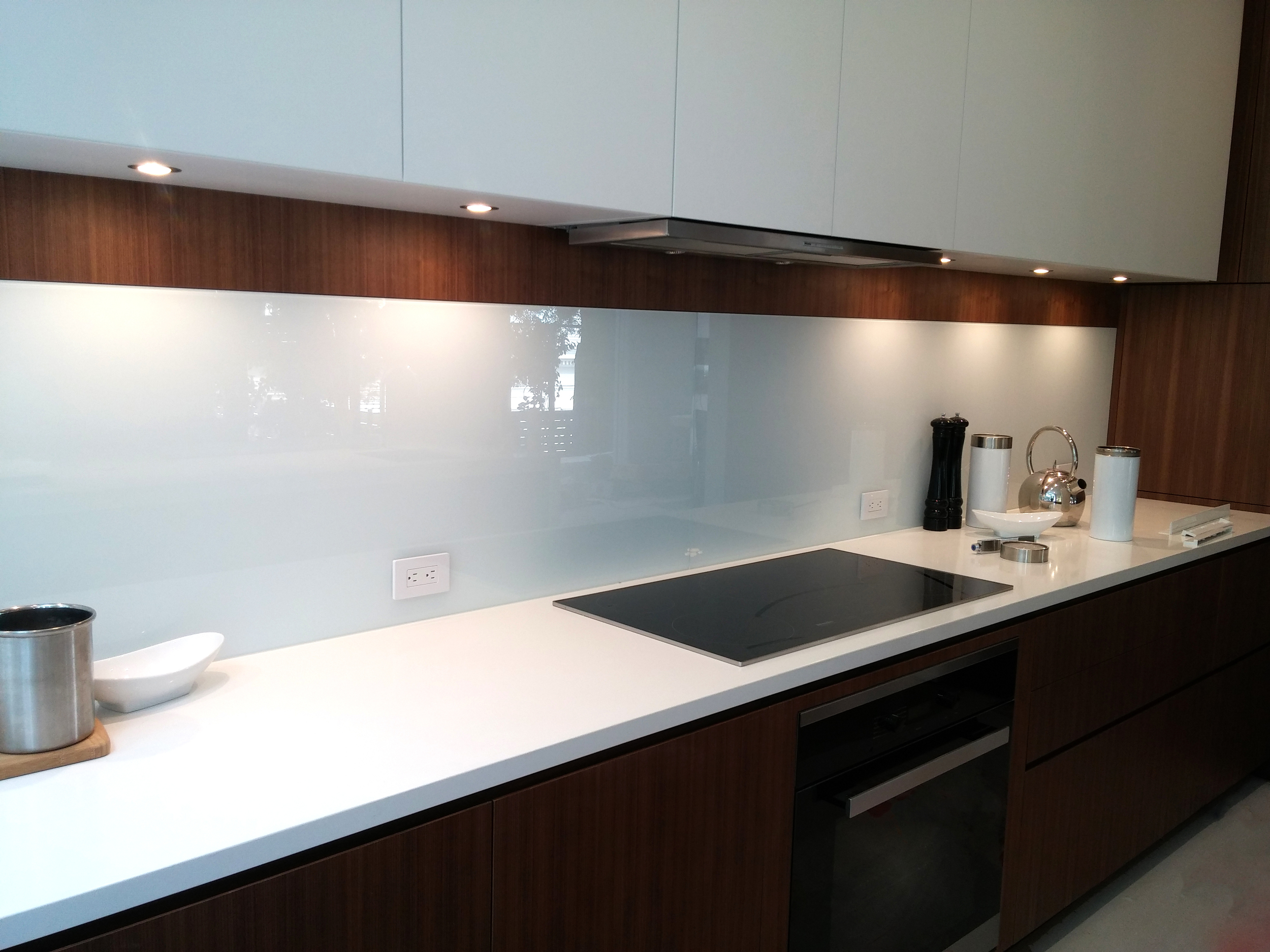 Painted glass kitchen back splash.