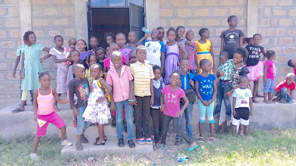 These kids. Posing outside the Resource Center. Safe. Learning about Jesus. Having fun. You helped make this happen. Providing a quality Christian place for vulnerable kids to gather and know they are loved. Inside that door are games, art supplies, books, toys and teachers who care that these little ones are not left to neglect and abuse. "Asante sana Everybody!"