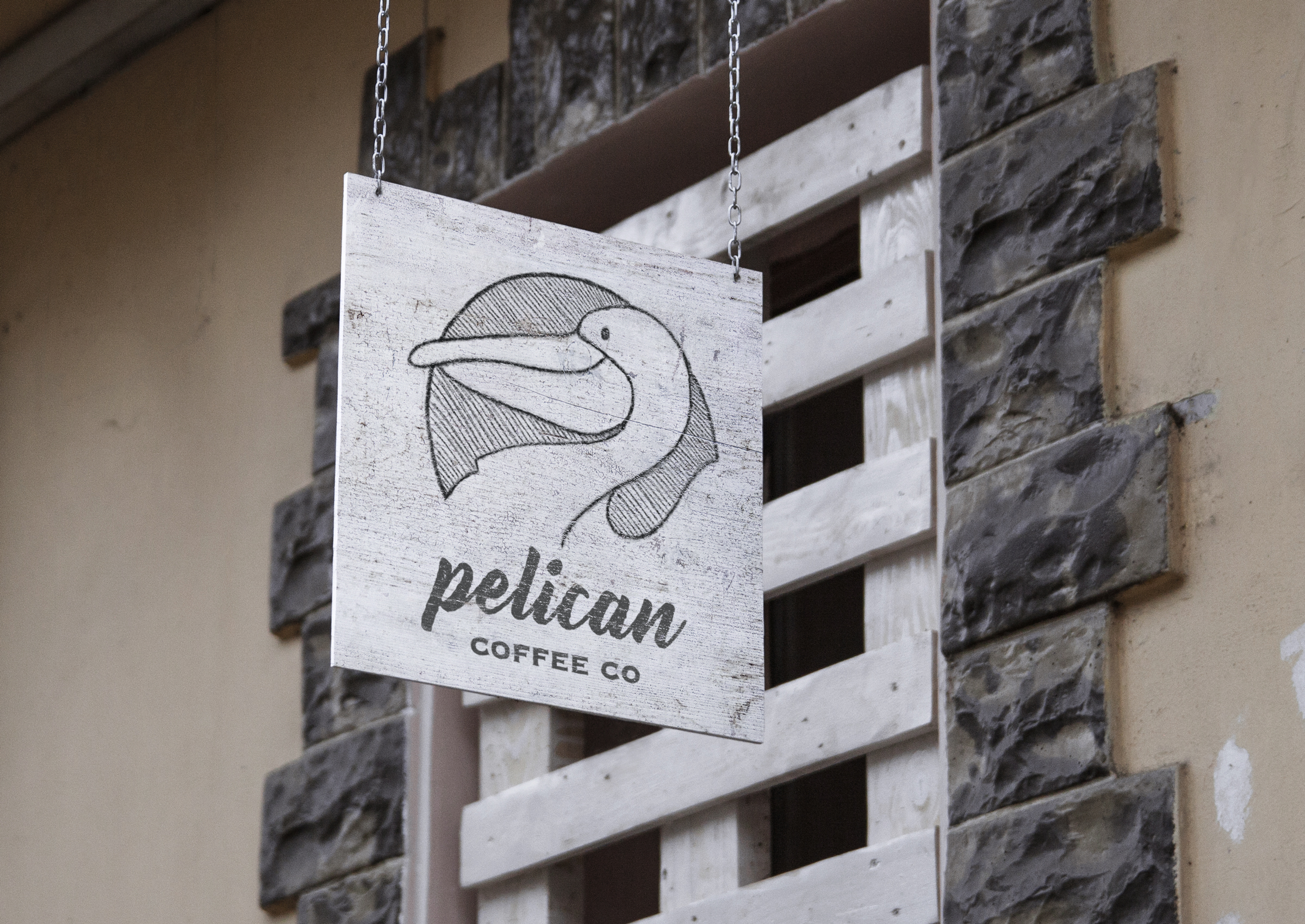 HangingSignMockUp_pelicancoffee.jpg