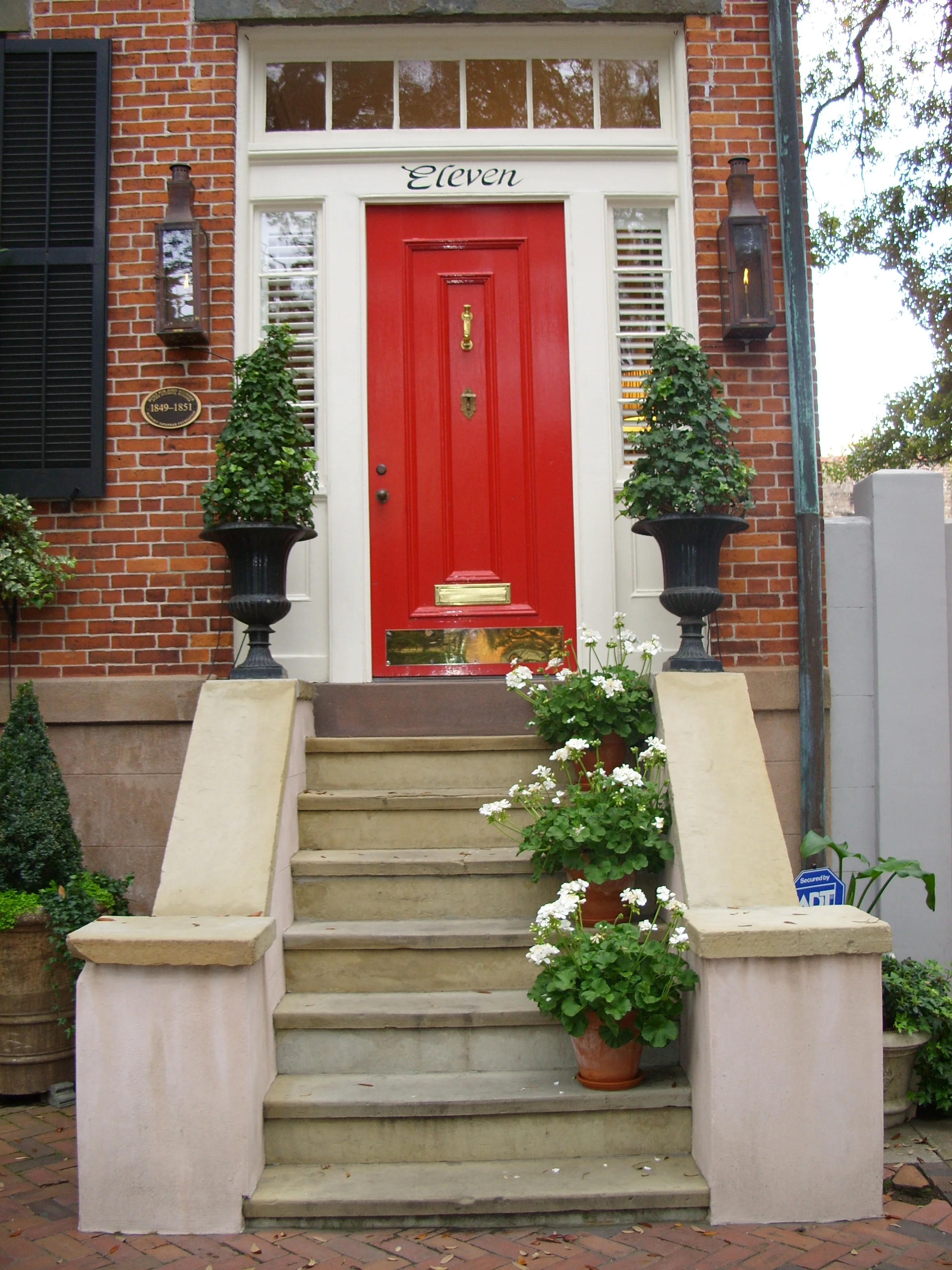  The red door of a historic townhouse on Jones Street. 