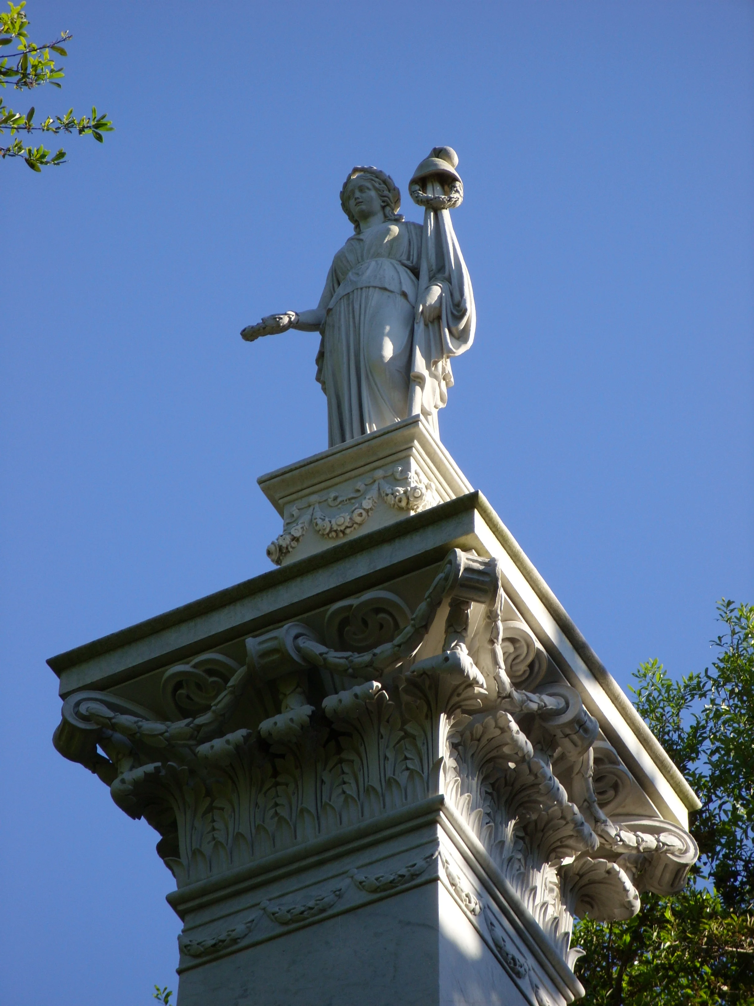  The statue of Liberty on top of the Pulaski monument in Monterey Square. 