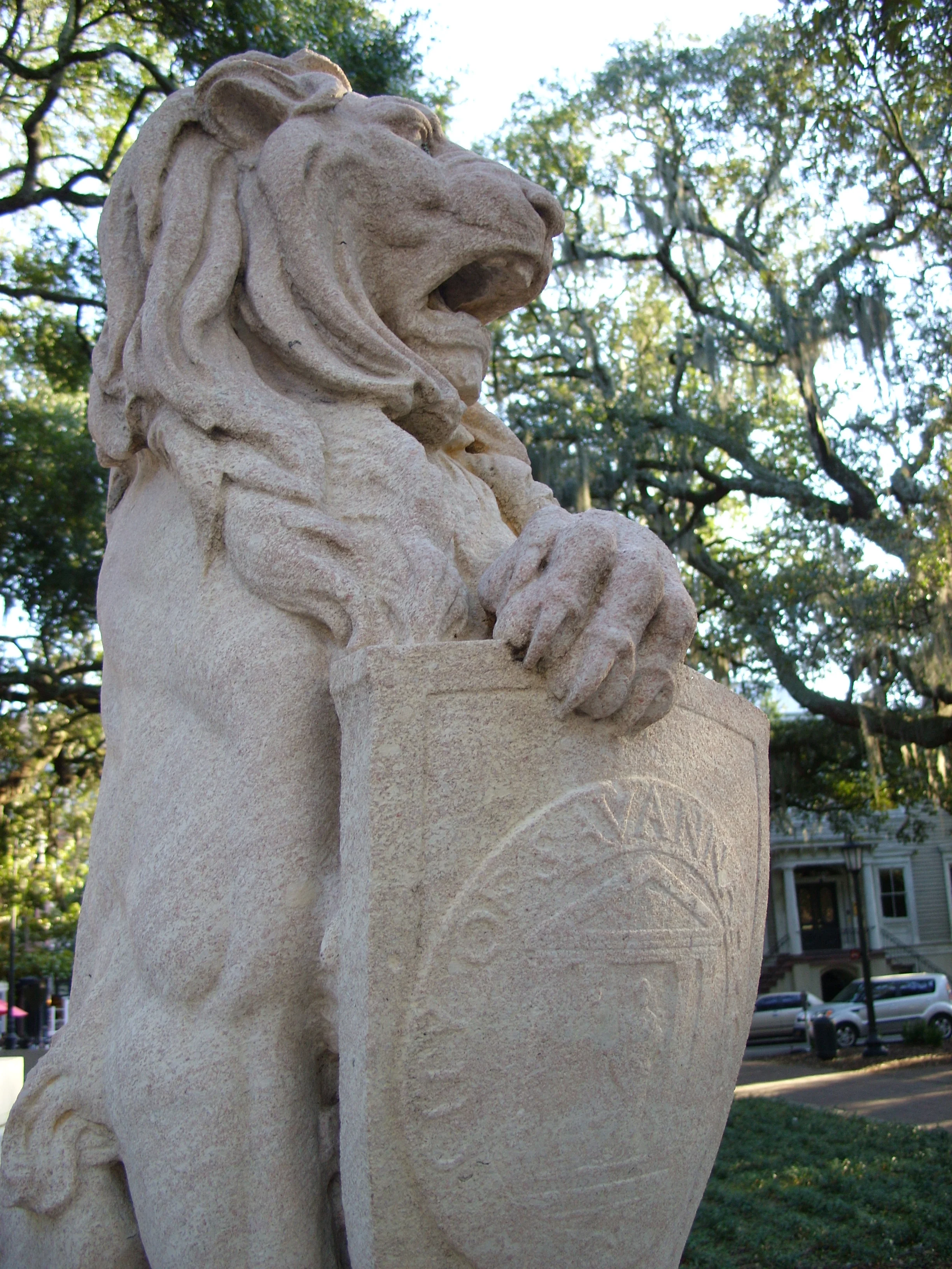  A lion on one corner of the Oglethorpe monument in Chippewa Square. This one holds the seal of the City of Savannah. 