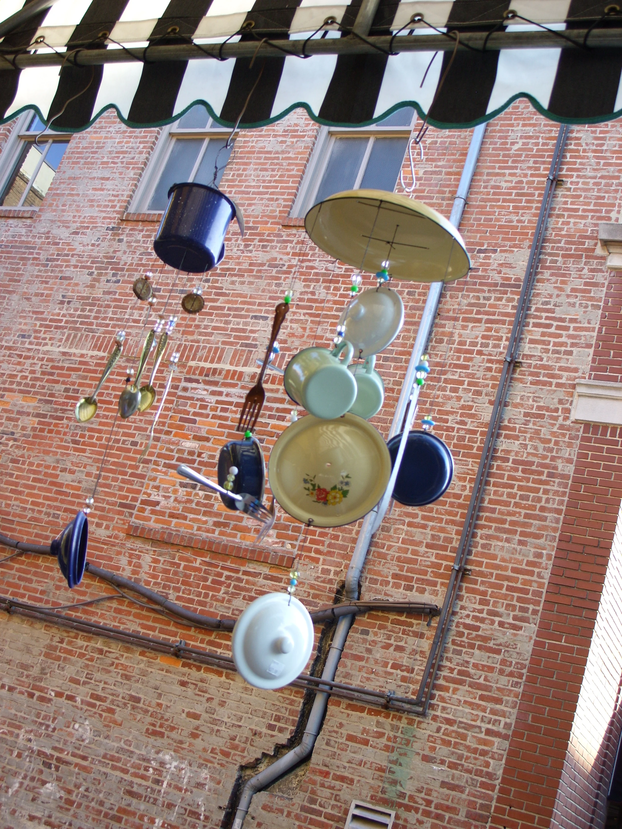  Wind chimes hanging outside Kitchens on the Square. 