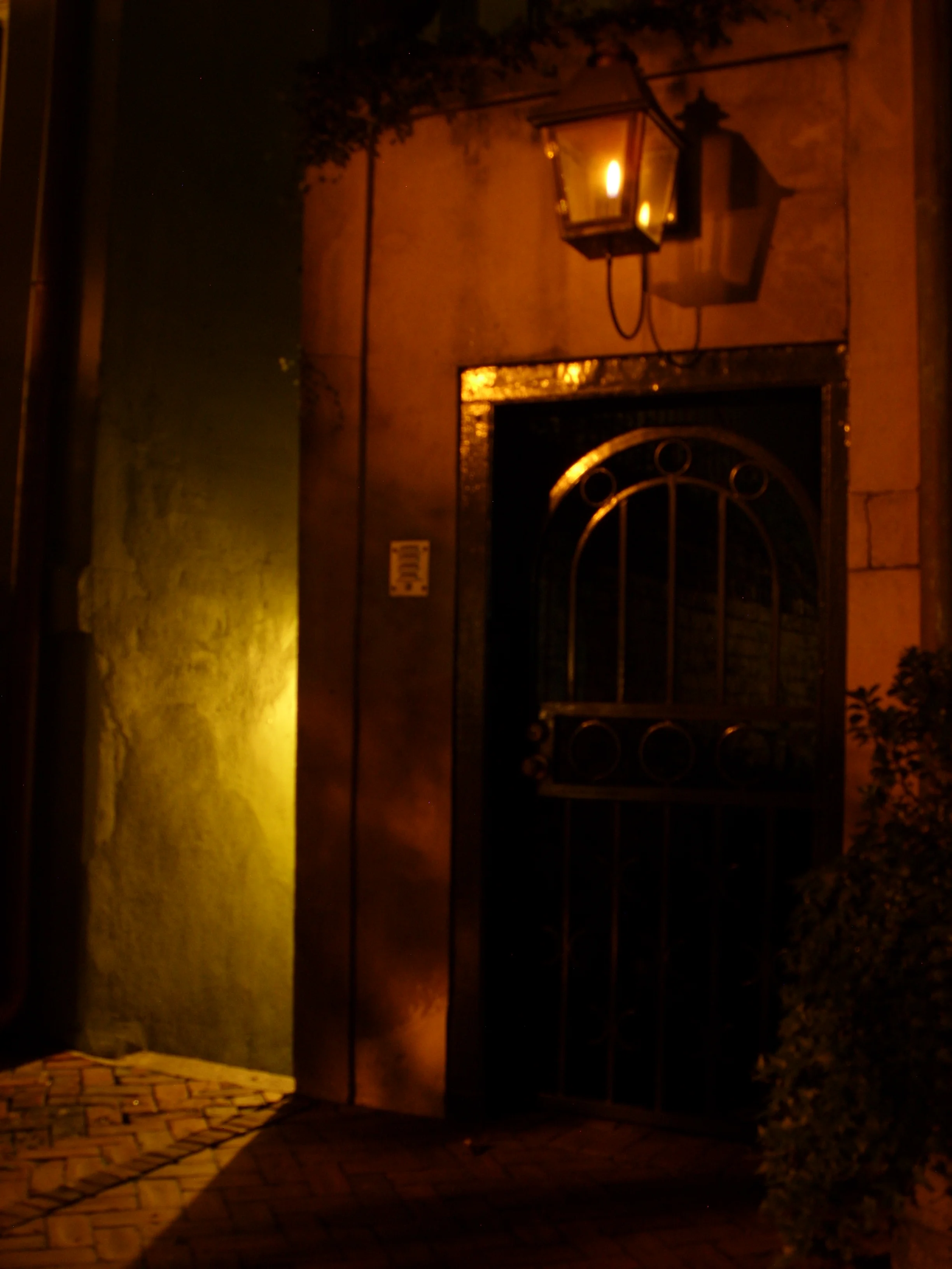  A door and passageway on Jones Street at night. 