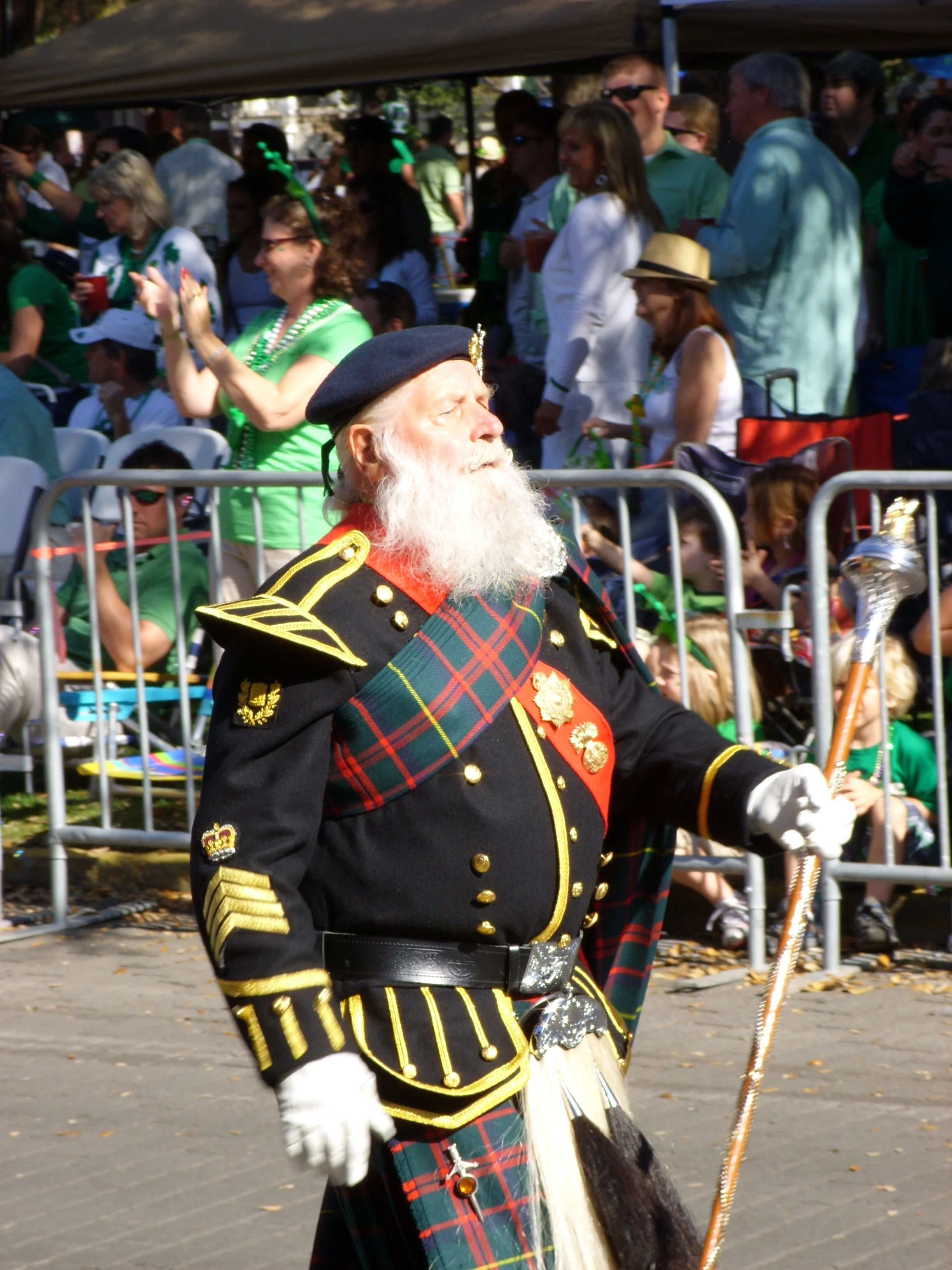  Leading the first pipe and drum band at the head of the parade 