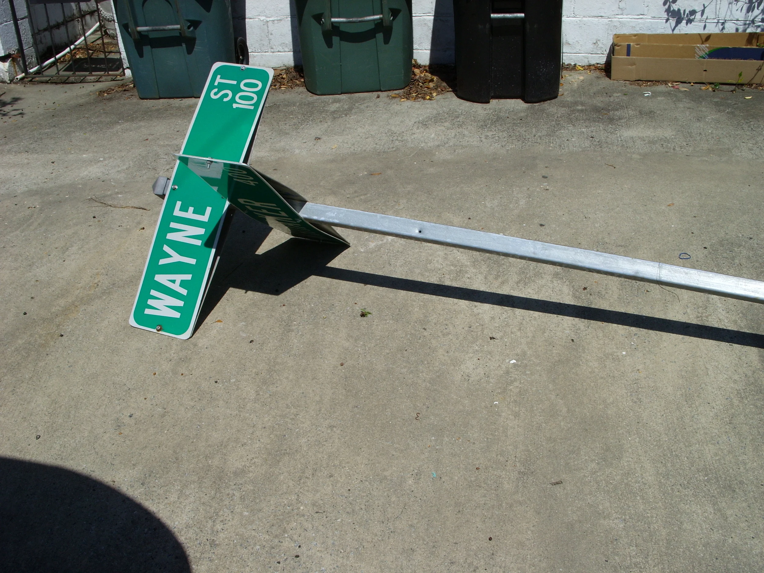  Go home, street sign! You're drunk! (post-parade festivities) 