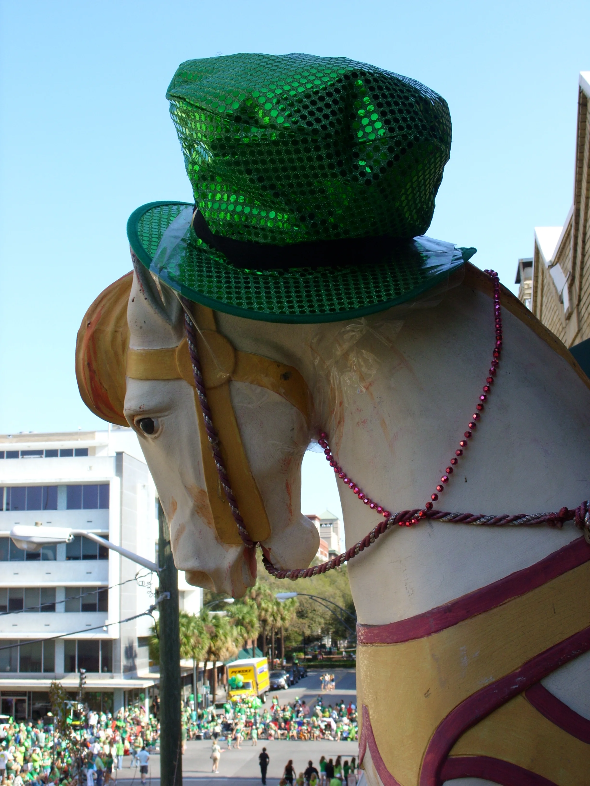  I got to watch the parade from a friend's balcony. She put a hat on her carousel horse 