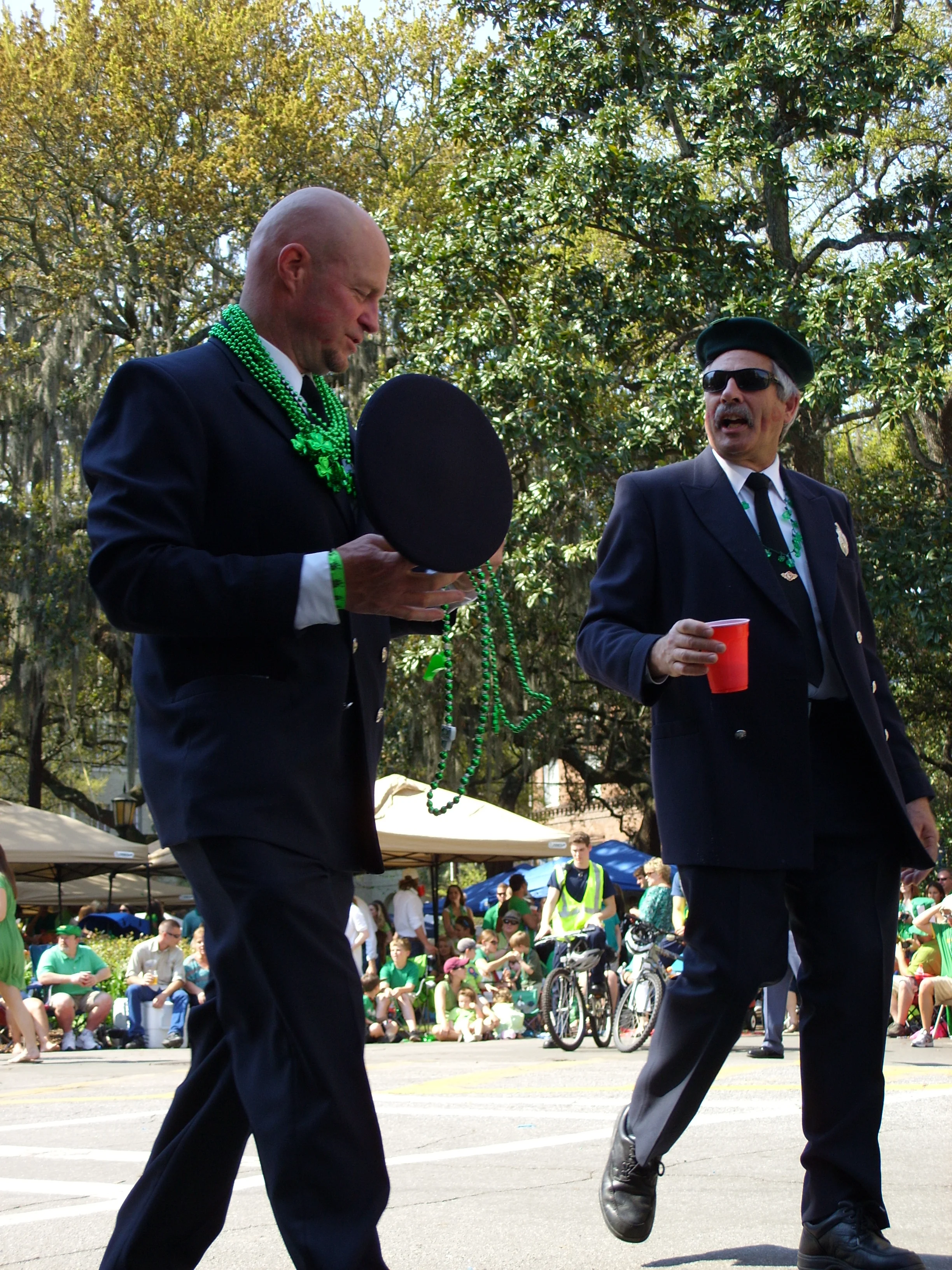  Some police strolling by, to-go cups in hand 