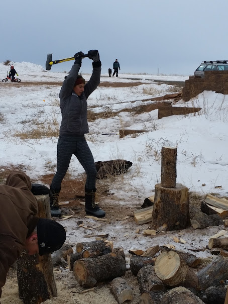Anya and her Dad - A wood chopping family affair. Photo credit: Owen Gue (who was the master wood-chopper when not taking photos)