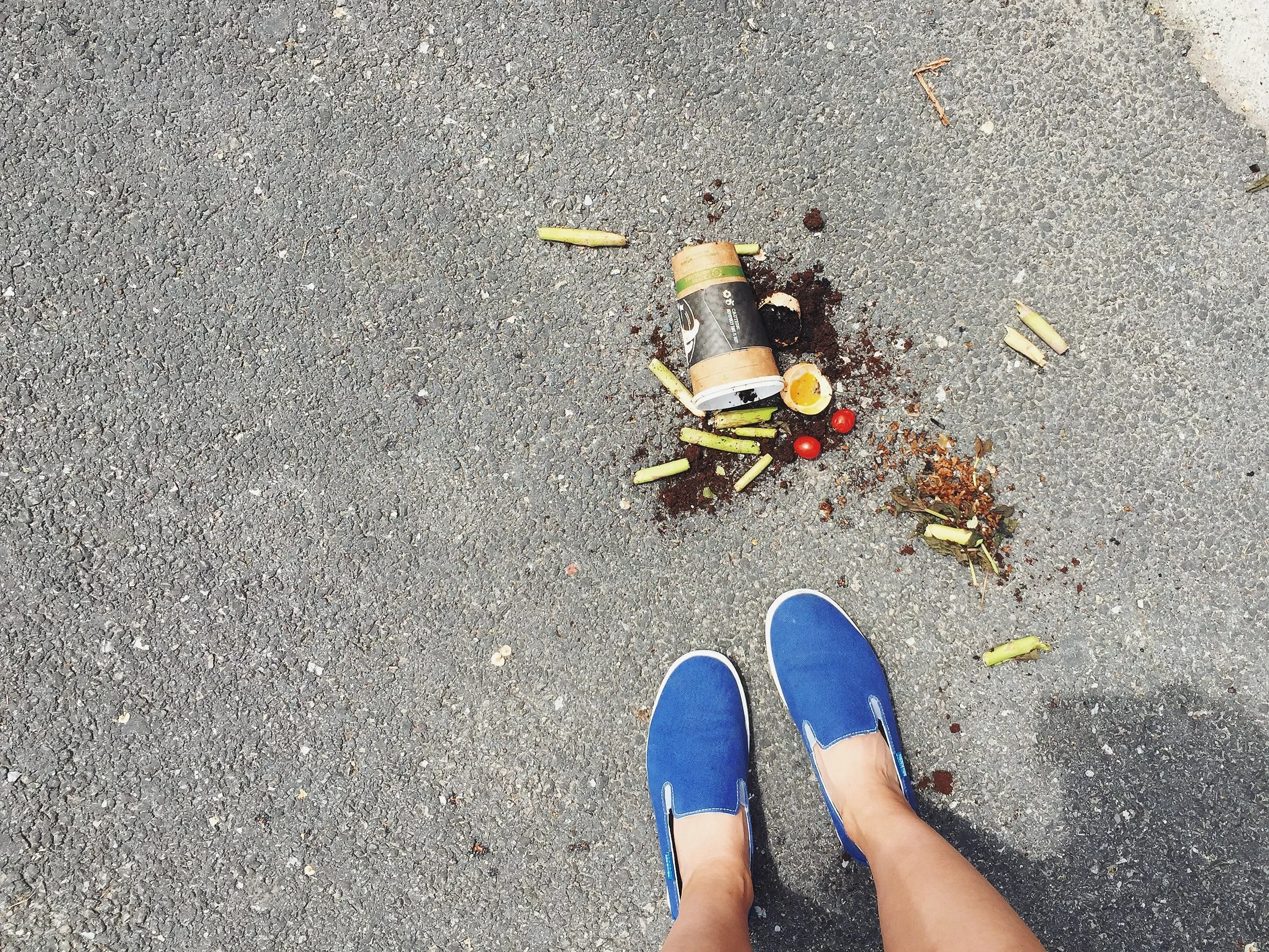 "If you look at my phone, there are a lot pictures of my feet standing next to something. It's my way of documenting unusual things I come across -- like this cup of coffee grounds and eggs and stuff, which was just a really funny scene. It must have been someone’s compost they were starting. "