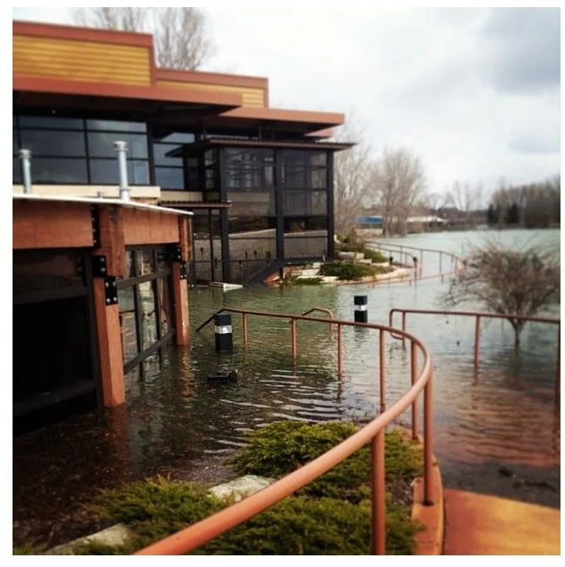  The Blue Water Grill was knowingly built upon a flood area. Because of this, we designed the back patio area to be able to flood once a year, then get back into working condition when the water retreats! 
