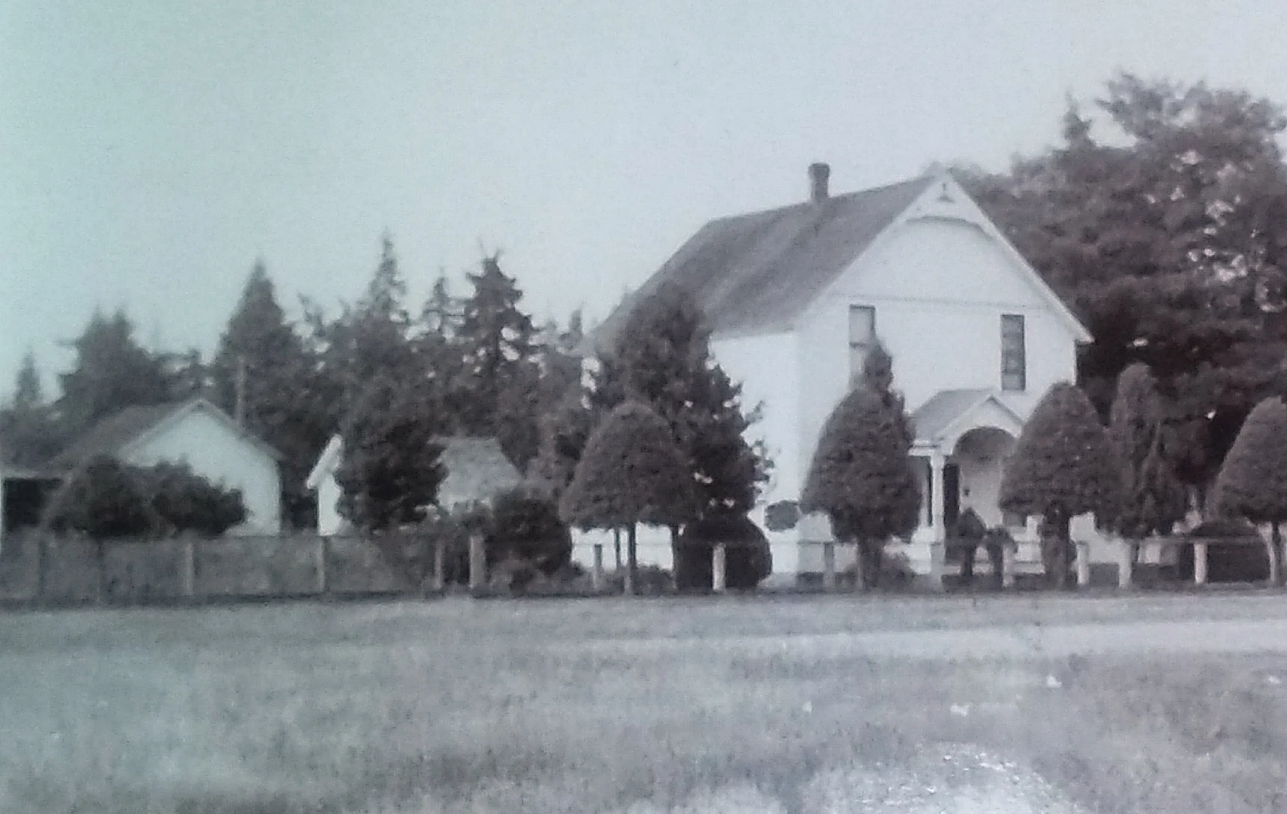 Our house with the root cellar just to the left.