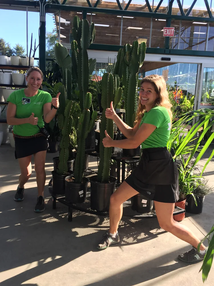 One of our houseplant gurus, Heather, and me. We're really excited with the new Euphorbia ingens we have for sale.