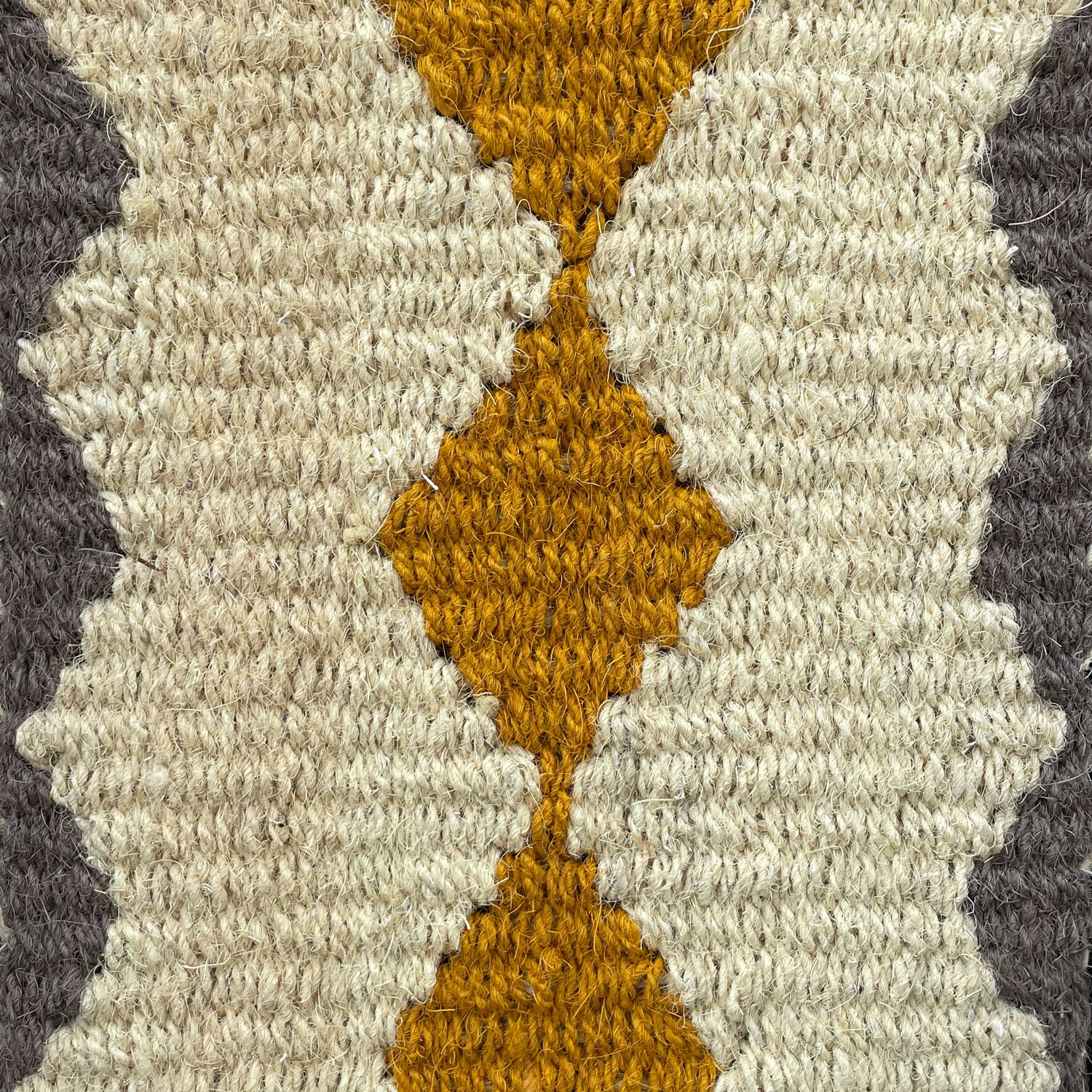 Patterned woven welcome mats
