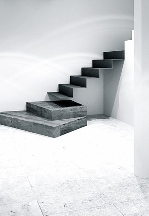 A hard and minimal palette suggests cool in the heat of Barcelona, Susanna Cots (above). 