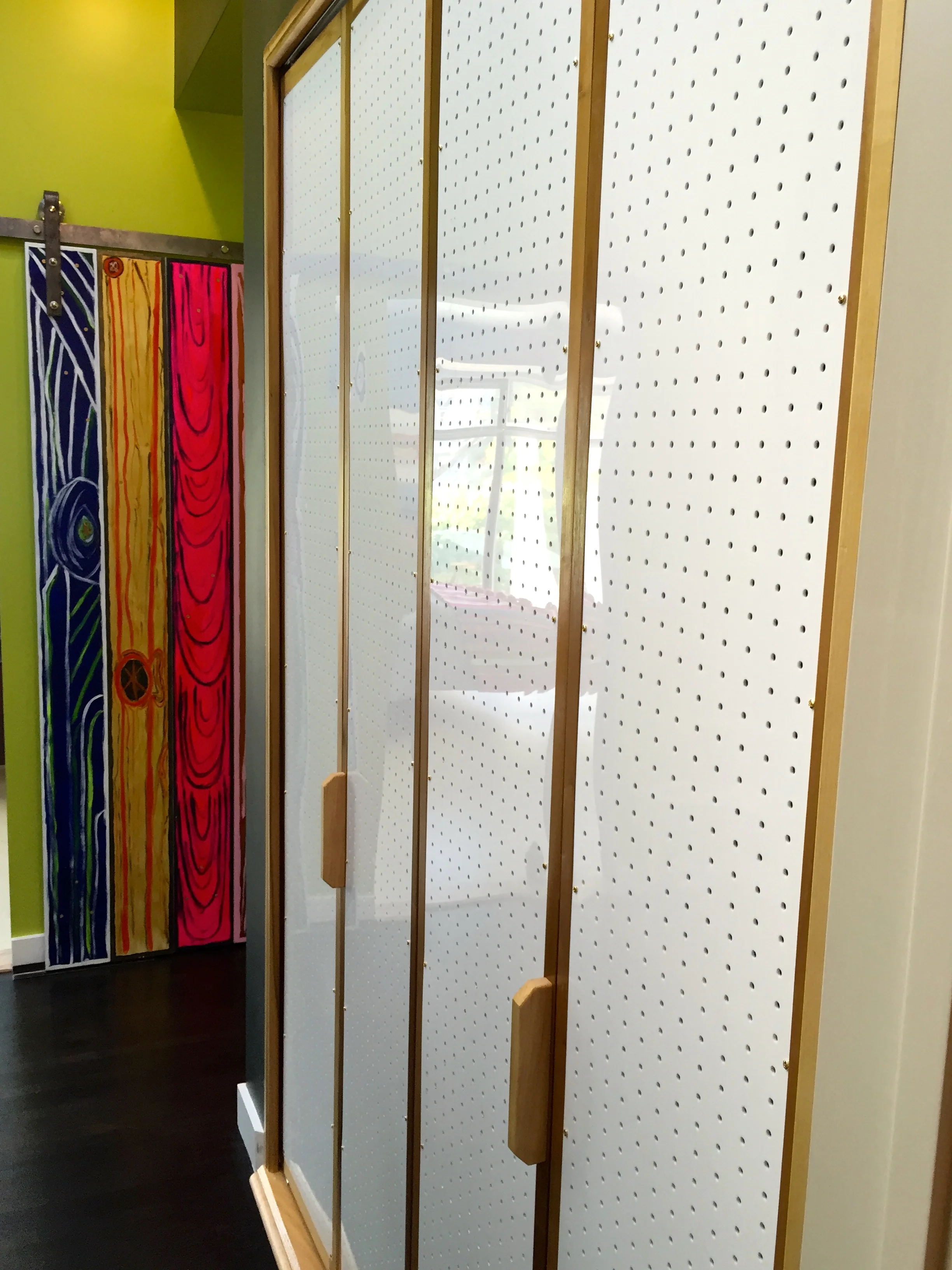 CUSTOM LAUNDRY ROOM DOORS - perforated plexi+oak