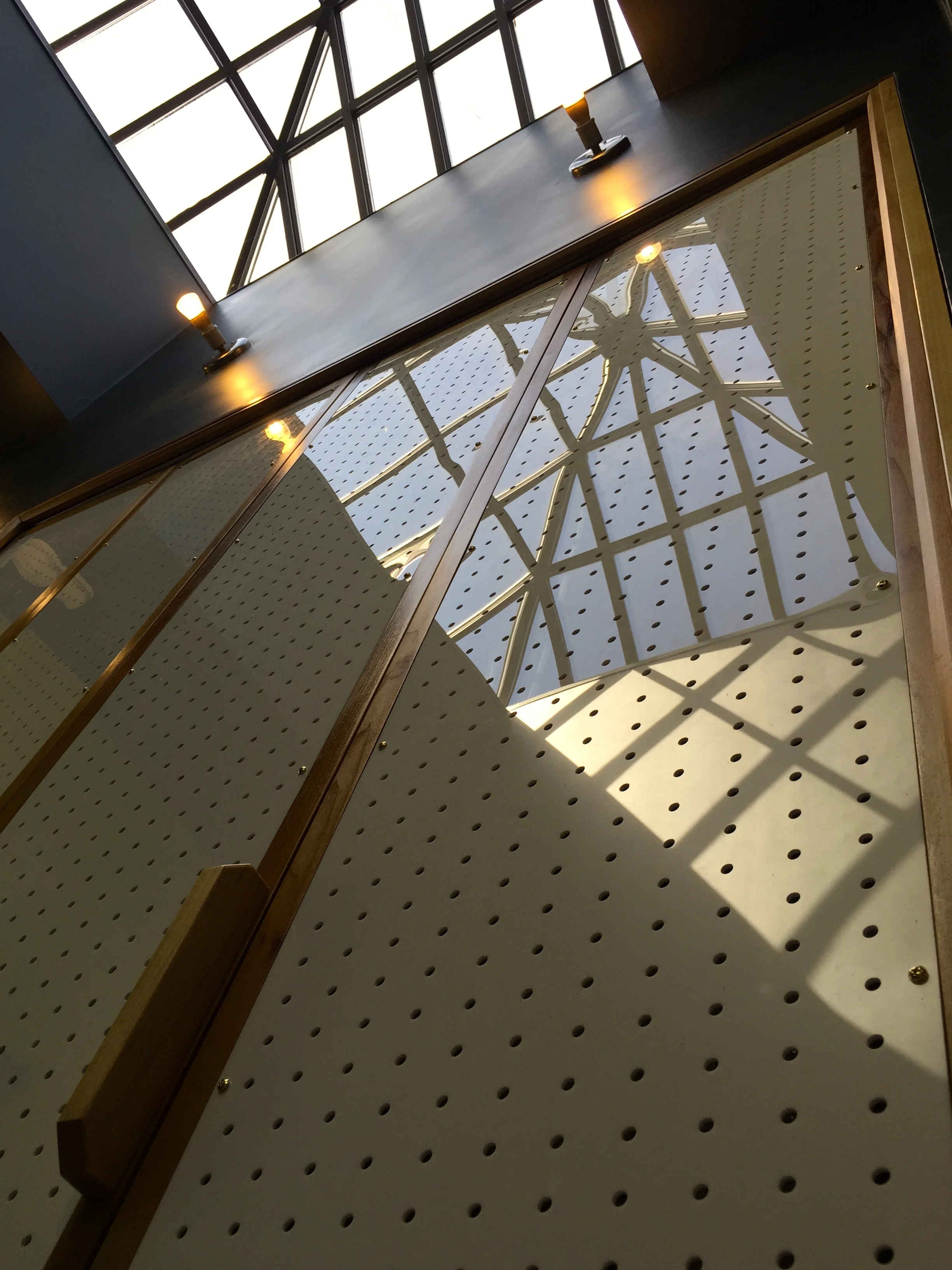 CUSTOM LAUNDRY ROOM DOORS - perforated plexi+oak - detail