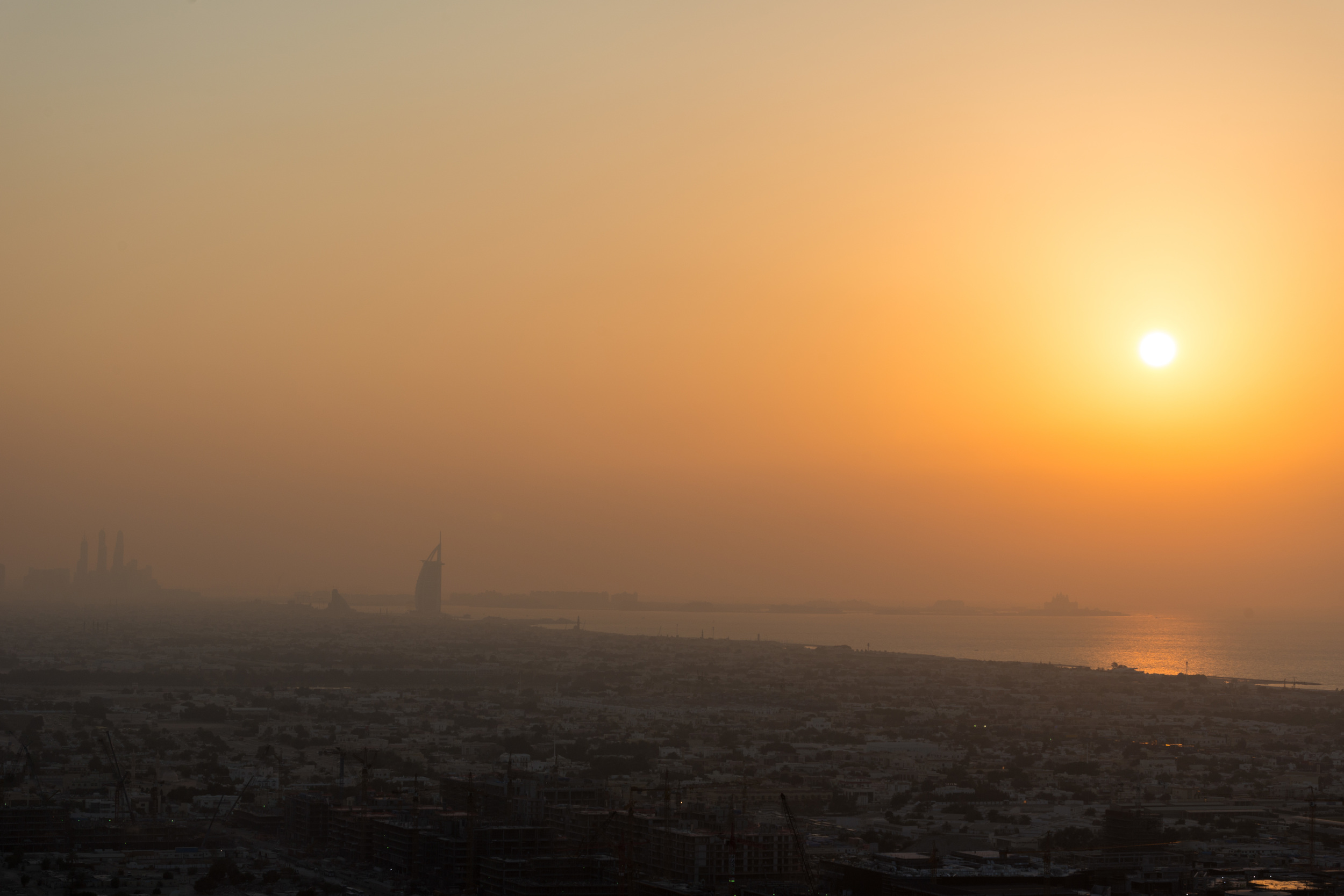 The sunset over the Burj al Arab in Dubai
