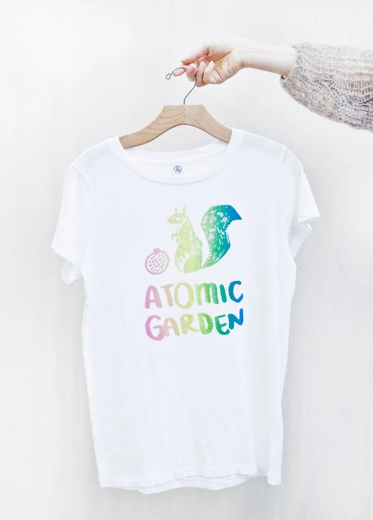 Hand-illustrated shirt graphic for Atomic Garden