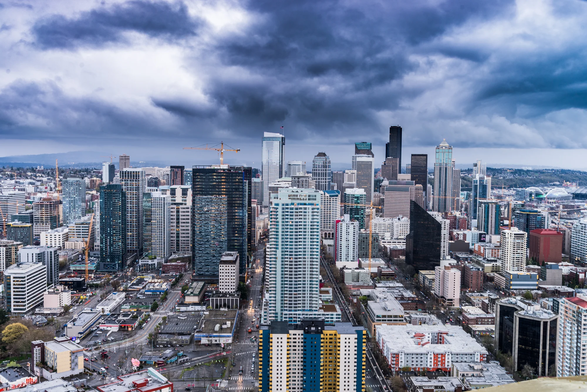 A look at a storm approaching Seattle, Washington from the observation deck of the Space Needle. 