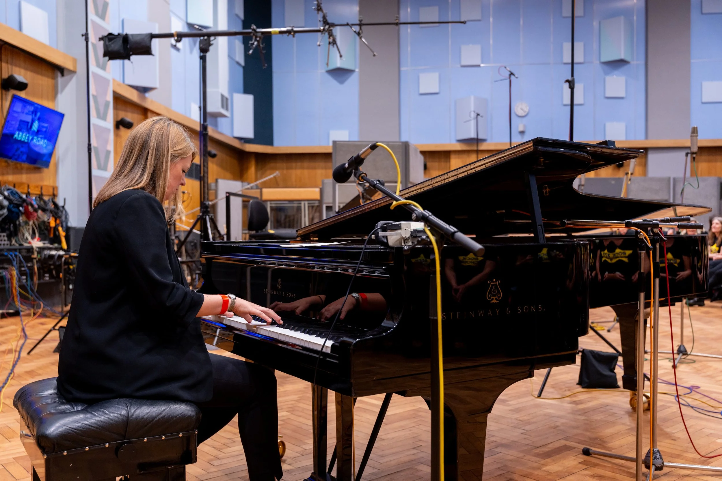 Joy Ellis accompanying Rock Choir at Abbey Road 3.jpg