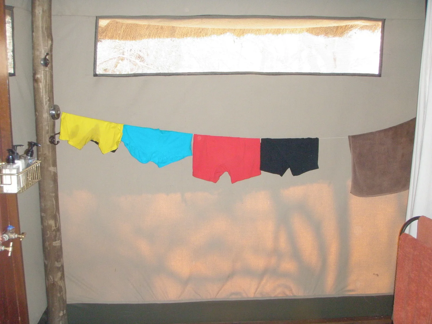 Ian's very colorful underwear hanging from a line in our room at Savute Camp in Botswana ( www.wilderness-safaris.com ). Trip booked with www.travelbeyond.com.