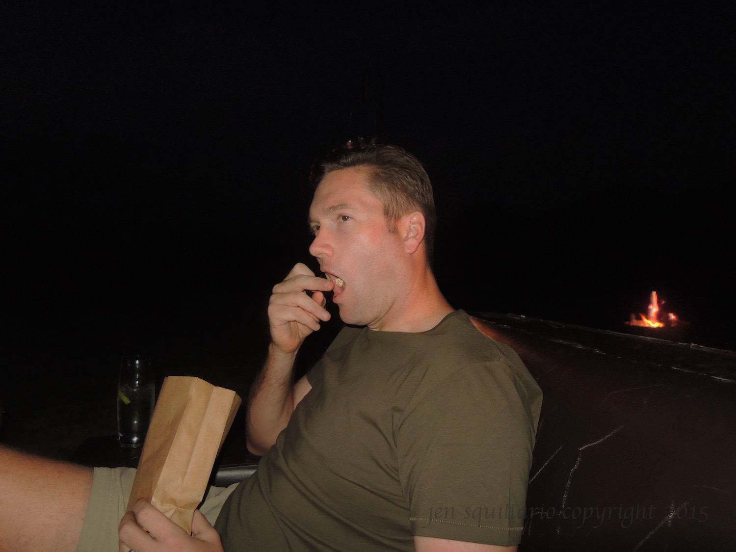  Ian enjoying some popcorn and a G&amp;T at the "Bush Cinema" 