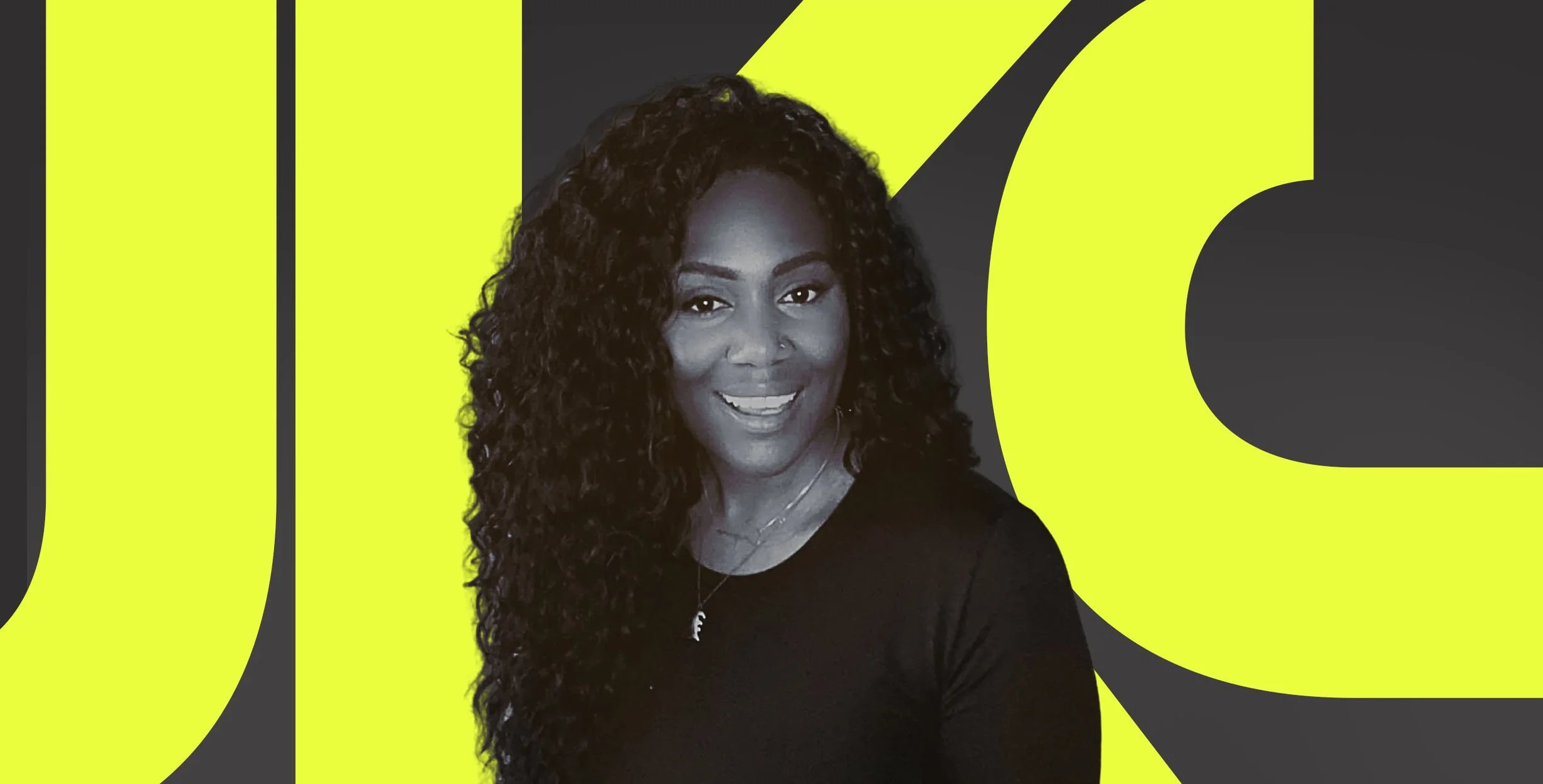 Creative Director, artist, designer Keisha Jordan with curly hair smiling, wearing a black top and necklace, against a background with large yellow and black graphical elements.
