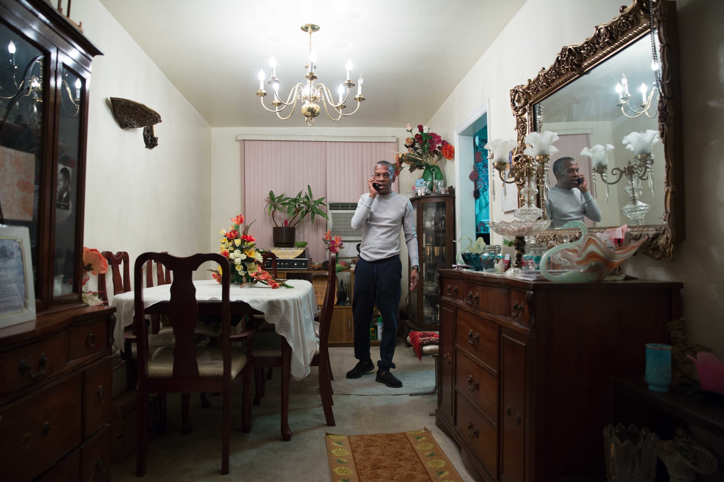 Ronald on the phone with his daughter, who lives in Anniston, Alabama. Ronald was sentenced to life in prison without the possibility of parole when she was three years old; she’s now in her late 30s. Ronald has never met one of his grandchildren.