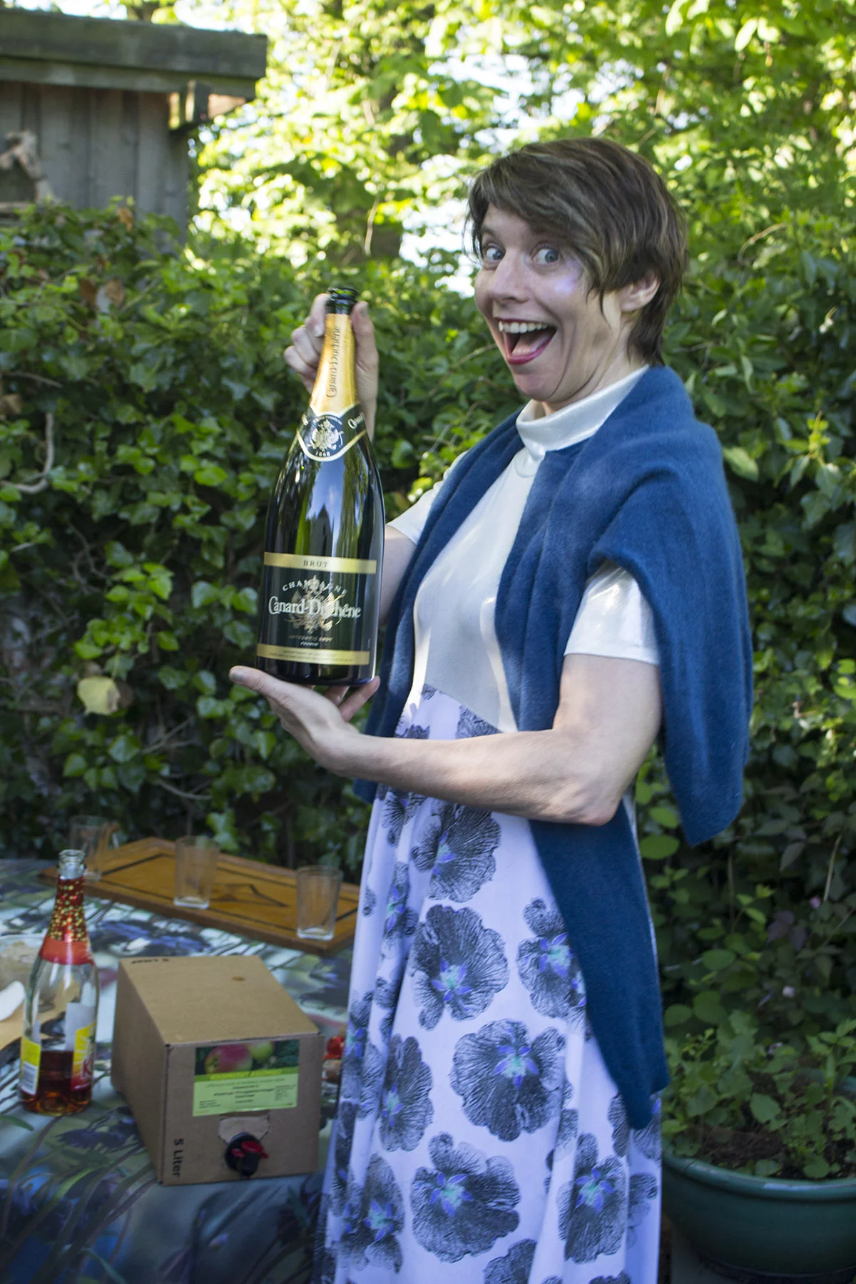 This is also me, celebrating mid-May 2017 in my mother's garden on Samsø, wearing the Bente gown . I don't know that I'd always style it with a wool sweater and a magnum Canard-Duchêne (assume, um, not), but Denmark can be sort of chilly and who says no to bubbly?! Don't judge. 