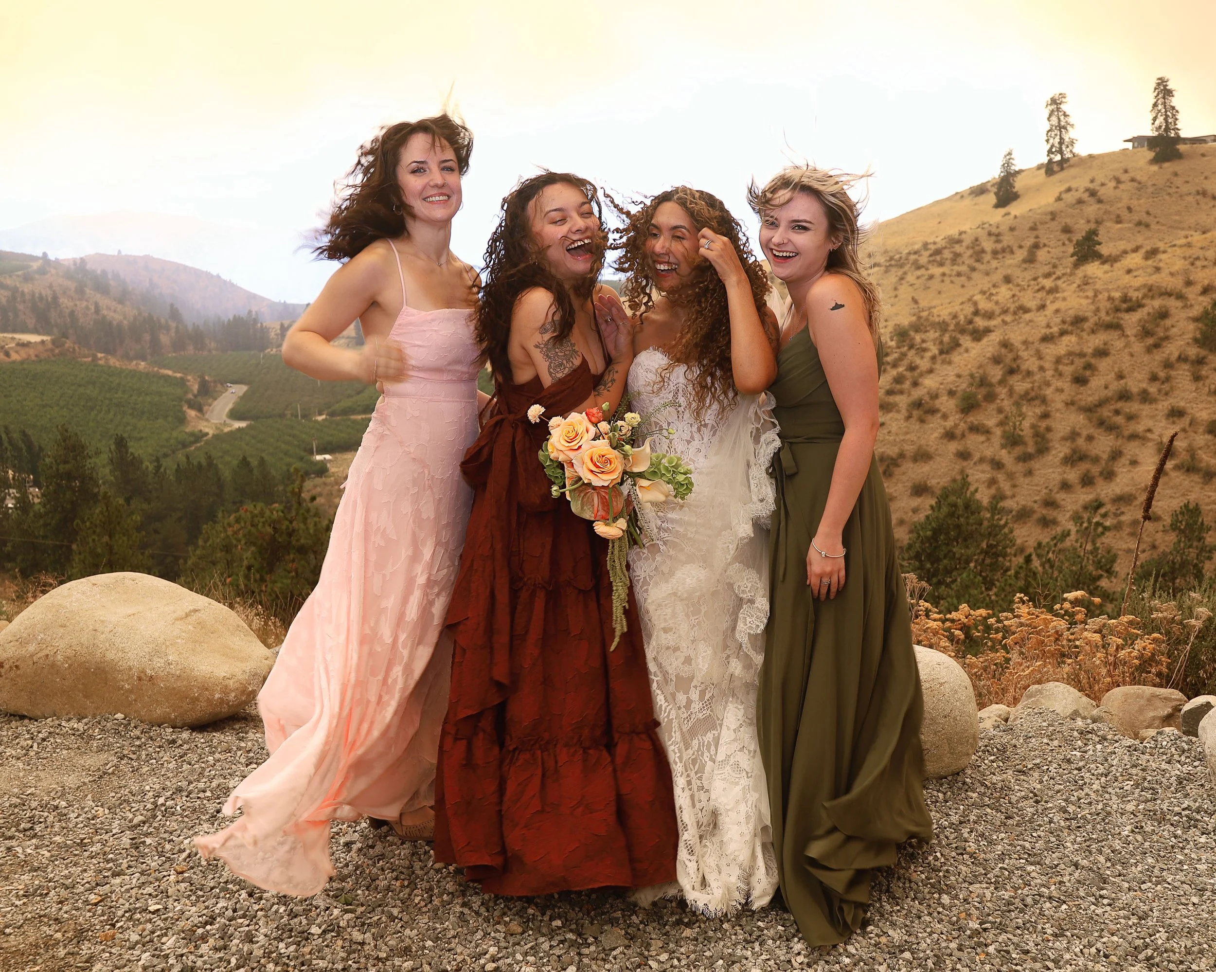Bridesmaids in the wind. Lake Chelan, WA in background
