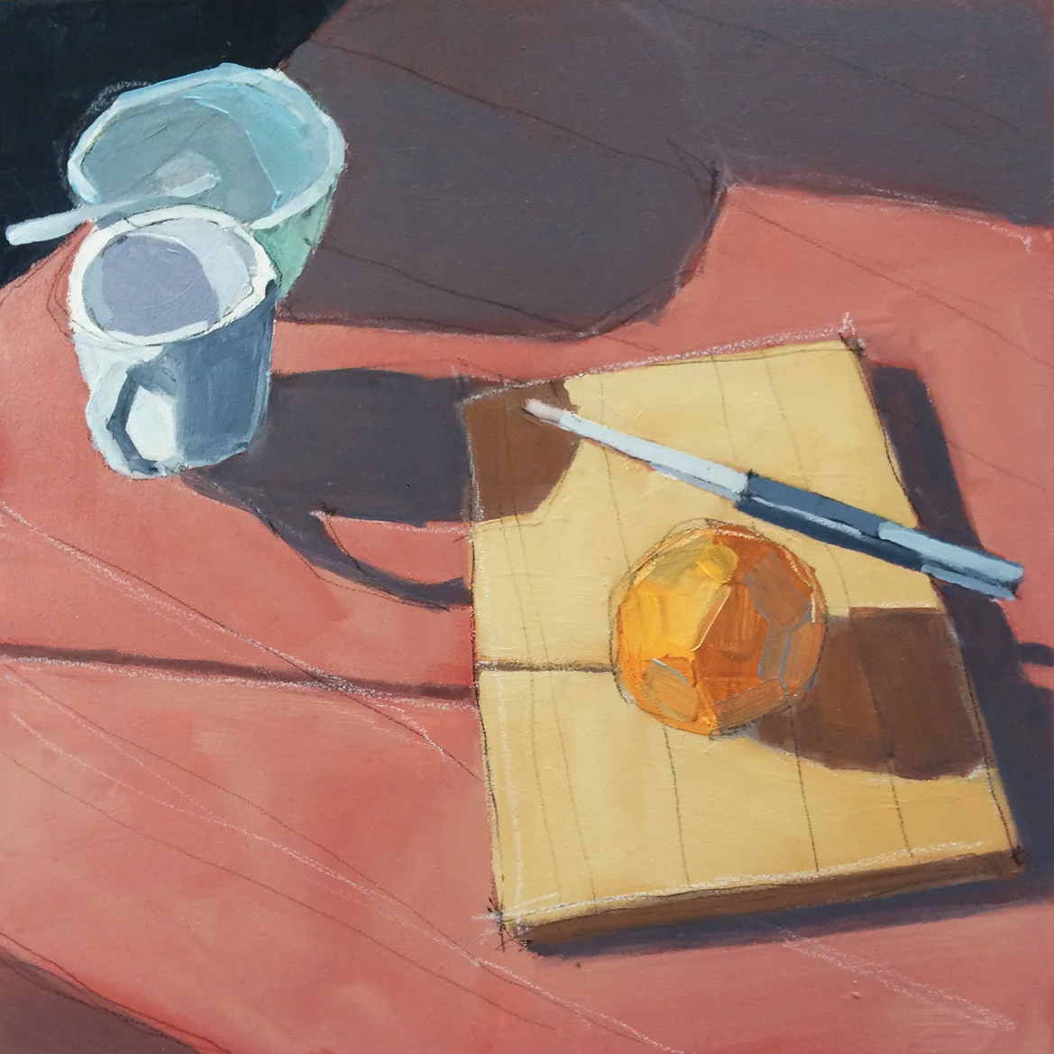 Orange on Red Table