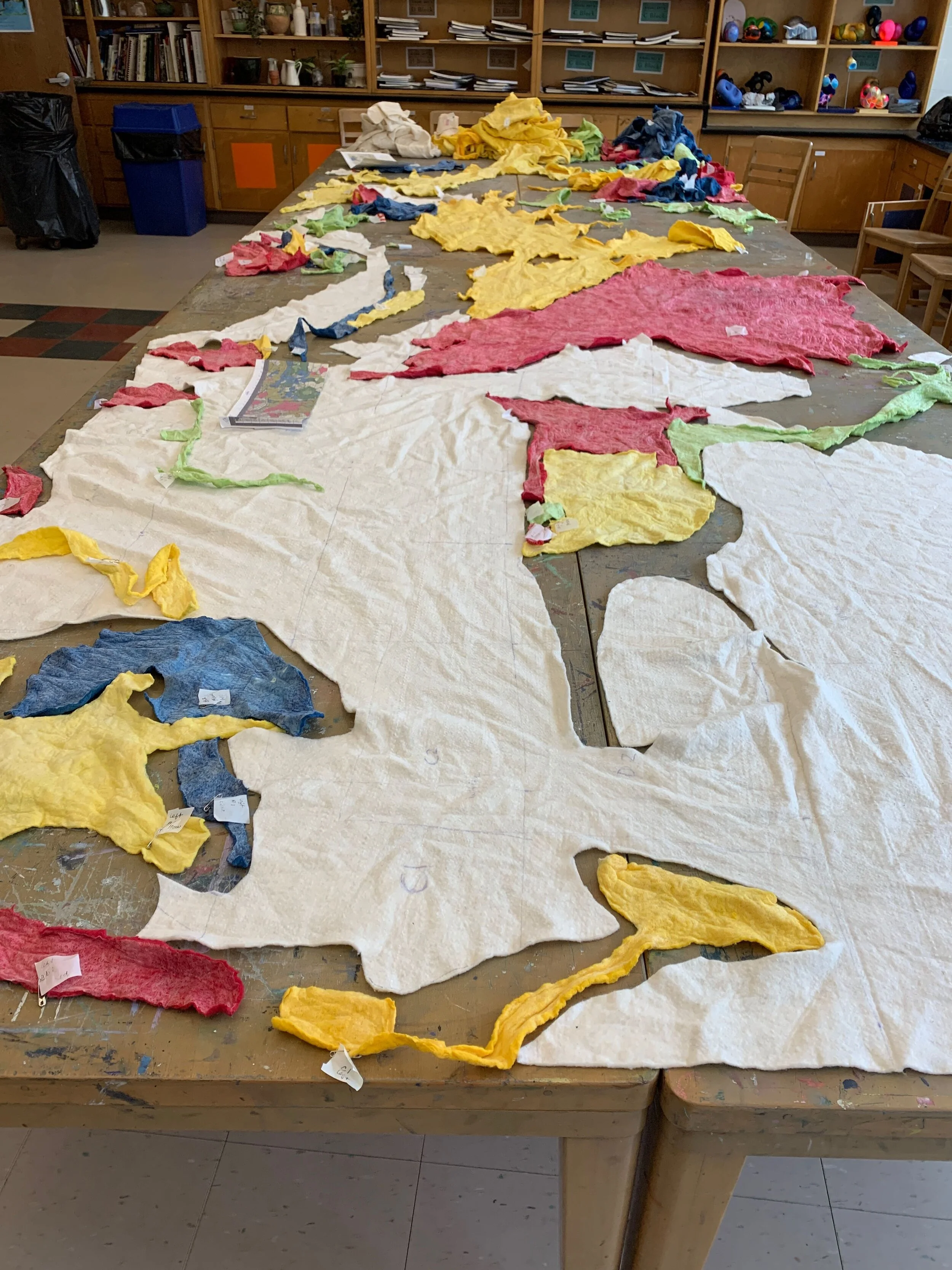 Once dry, it was pieced and pinned together before being stitched.