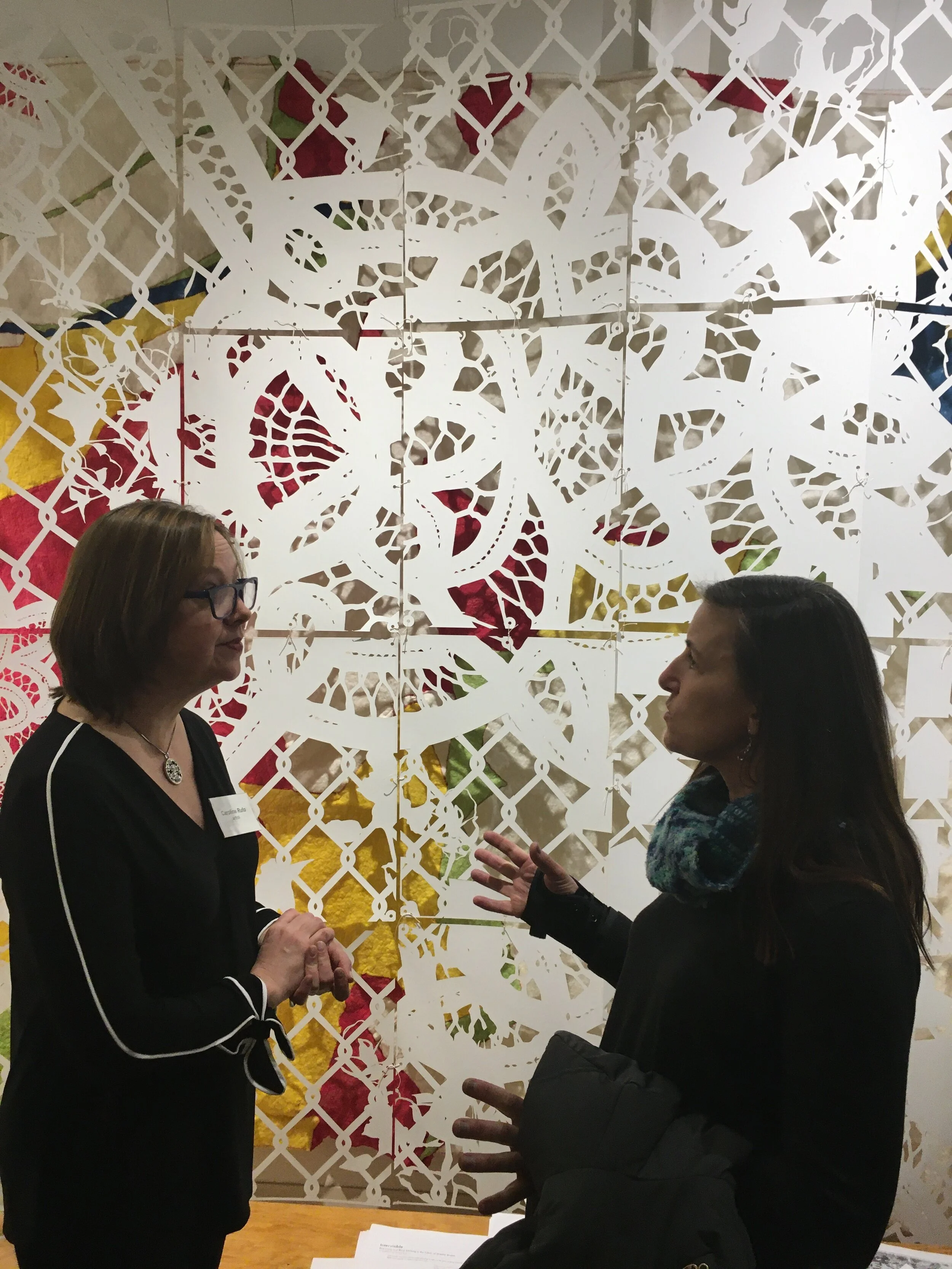 Caroline Rufo (left) with a guest at the artist’s reception. March 6, 2020.