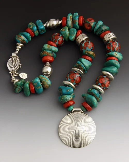 N 913 Kingman Turquoise w Medallion.jpg